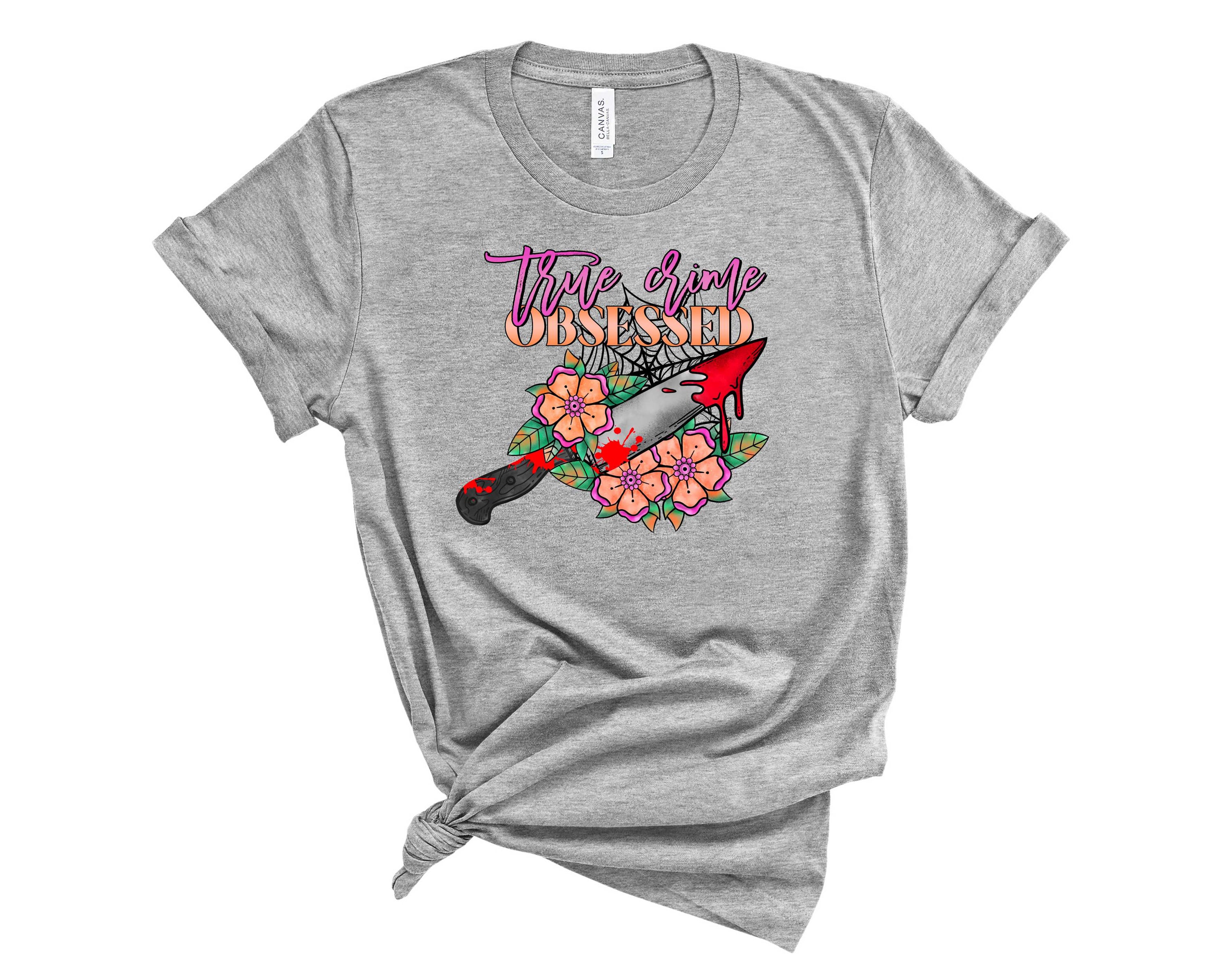 True Crime Obsessed Floral Graphic Tee featuring a stylish floral design on a comfortable unisex t-shirt.