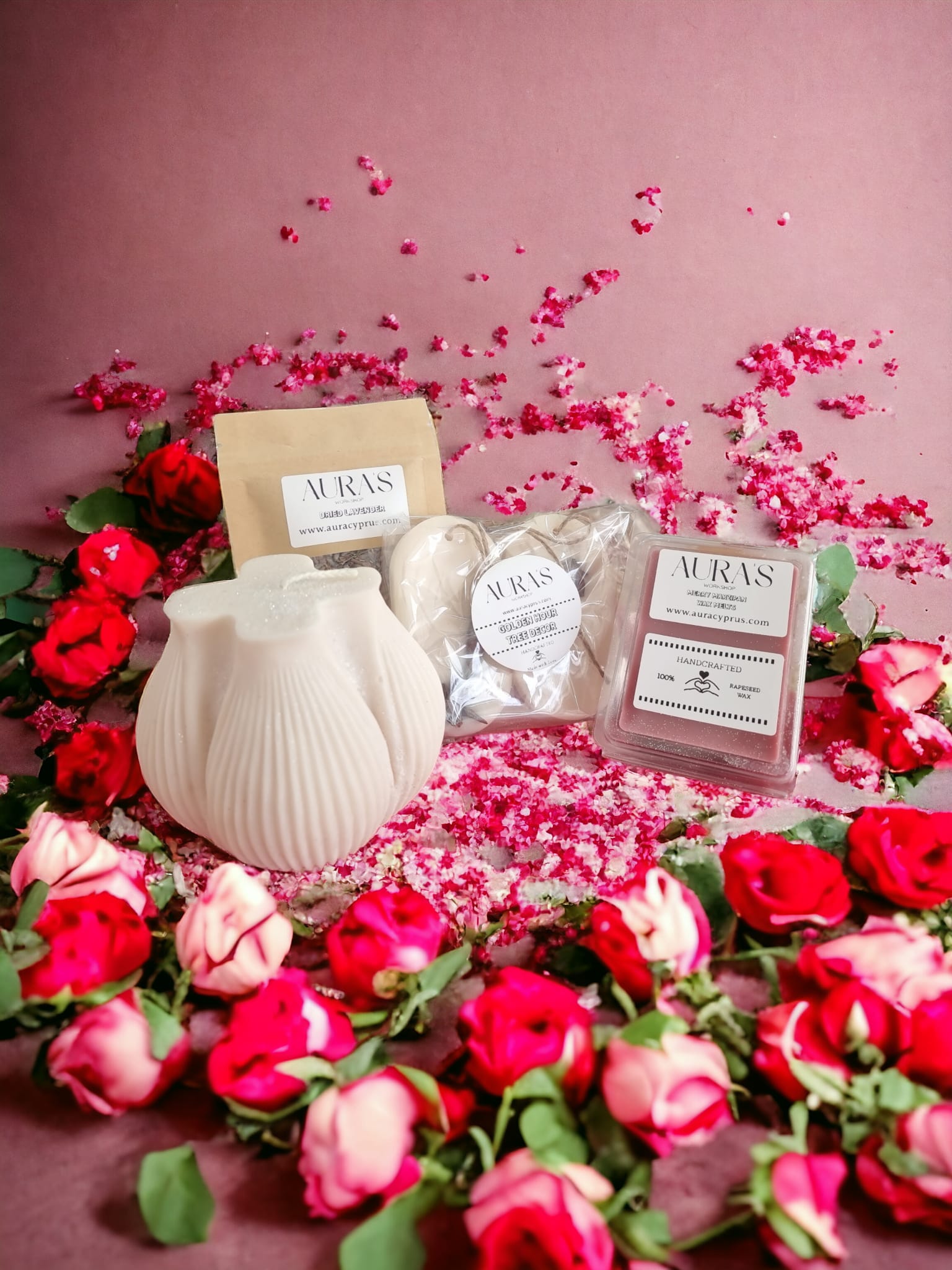 Valentine's Gift Set featuring a large candle, marzipan wax melts, wax wardrobe fragrants, and dried lavender, beautifully arranged.