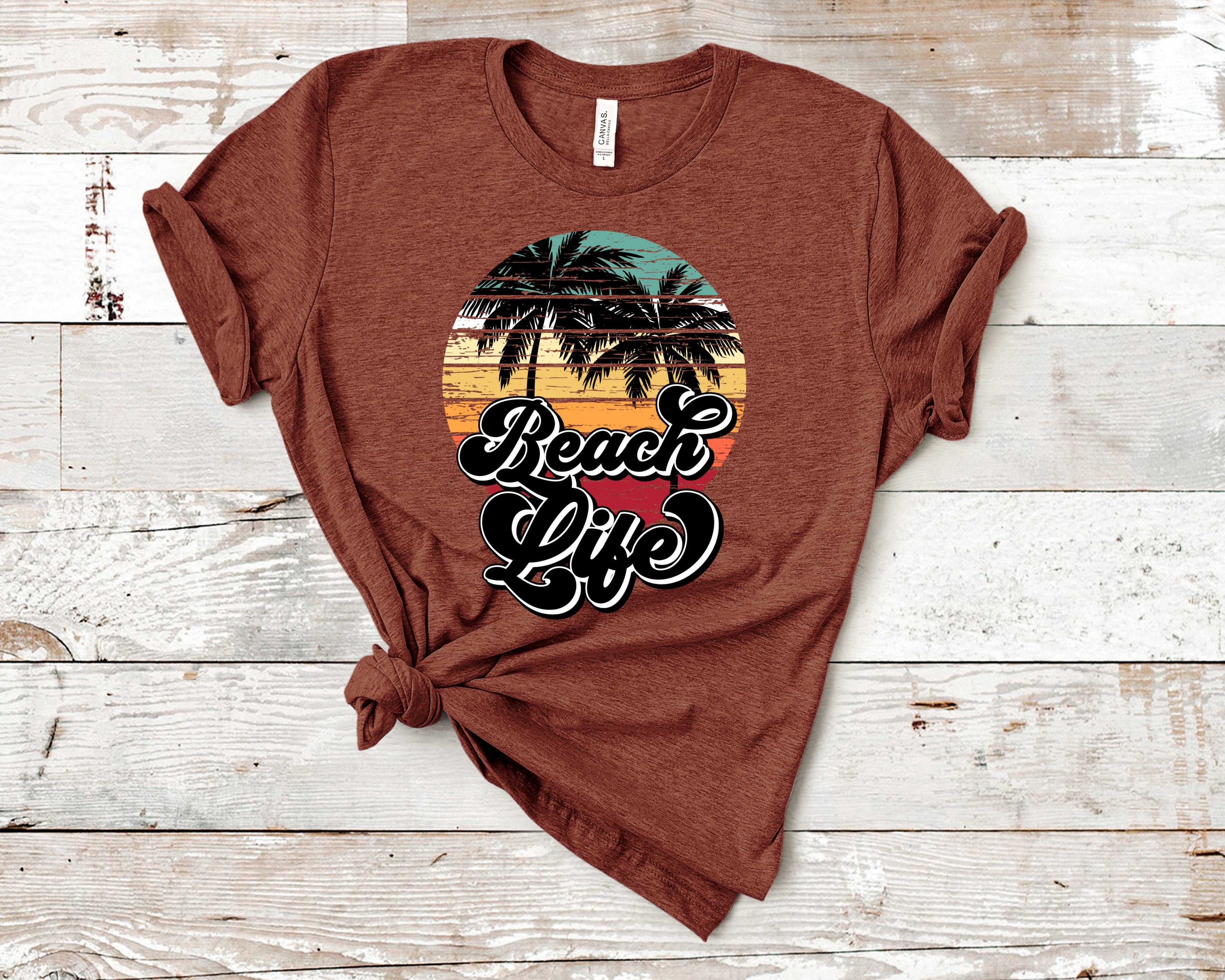 Vintage Beach Life Palms Graphic Tee featuring palm tree design on a unisex t-shirt, perfect for casual wear.