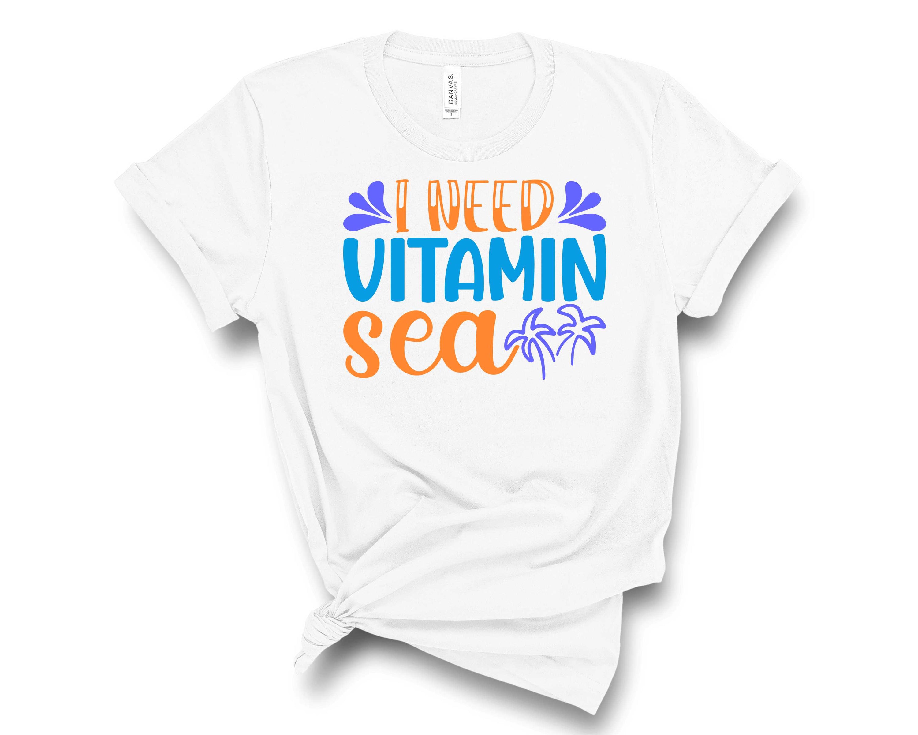 A stylish unisex Vitamin Sea graphic tee featuring vibrant ocean-themed artwork, perfect for beach lovers.