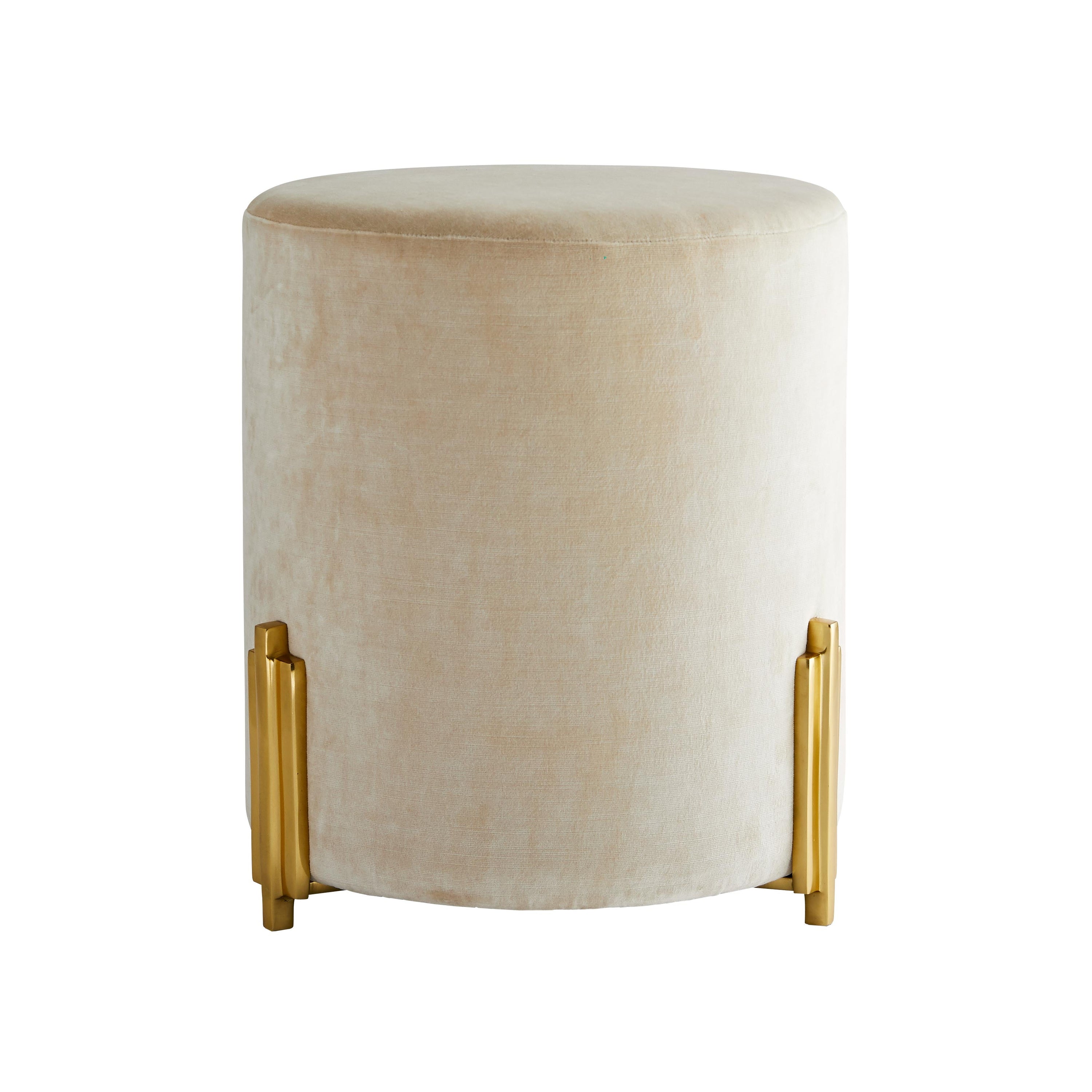 Warby Ottoman Sterling Silver featuring luxurious velvet upholstery and a polished brass base, showcasing an elegant drum-style design.