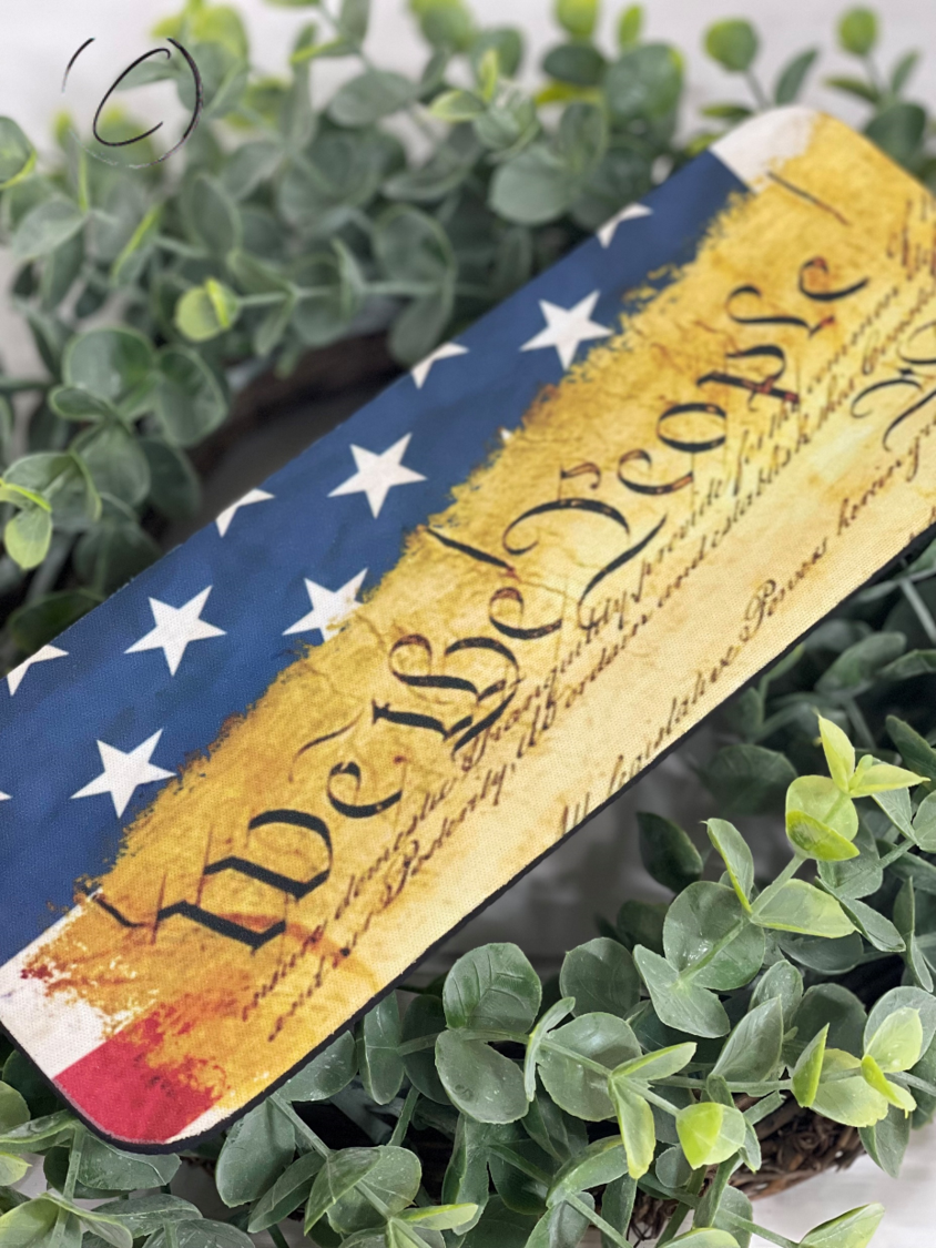 We The People Slap Wrap Can Cooler in vibrant colors, designed to fit 12oz cans and bottles, made of durable neoprene material.