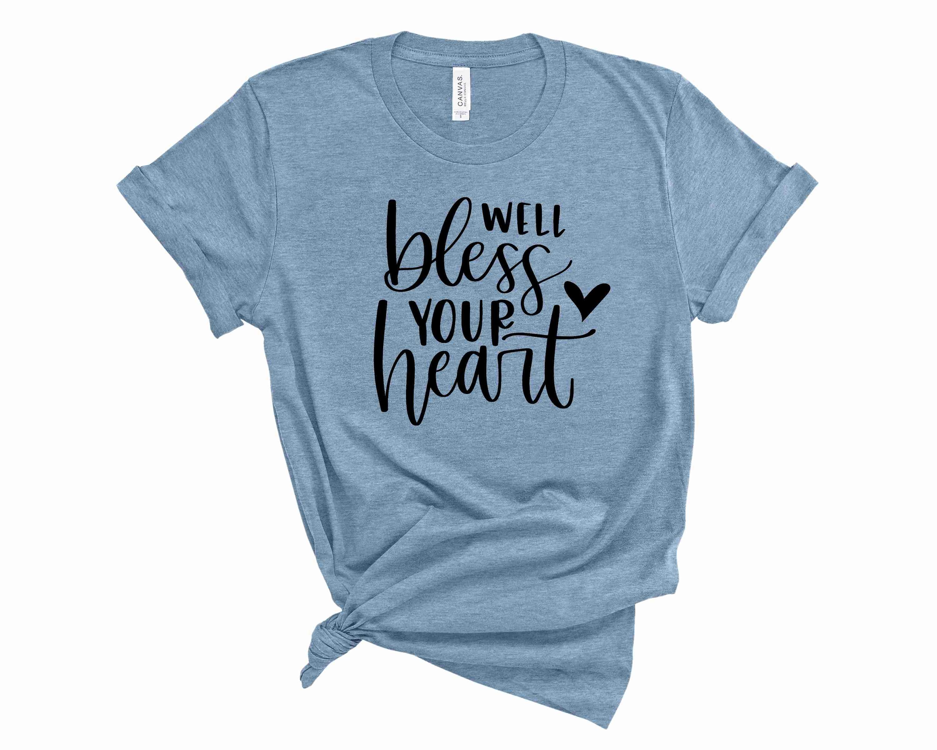 Well Bless Your Heart Graphic Tee featuring a trendy design on a soft unisex t-shirt.