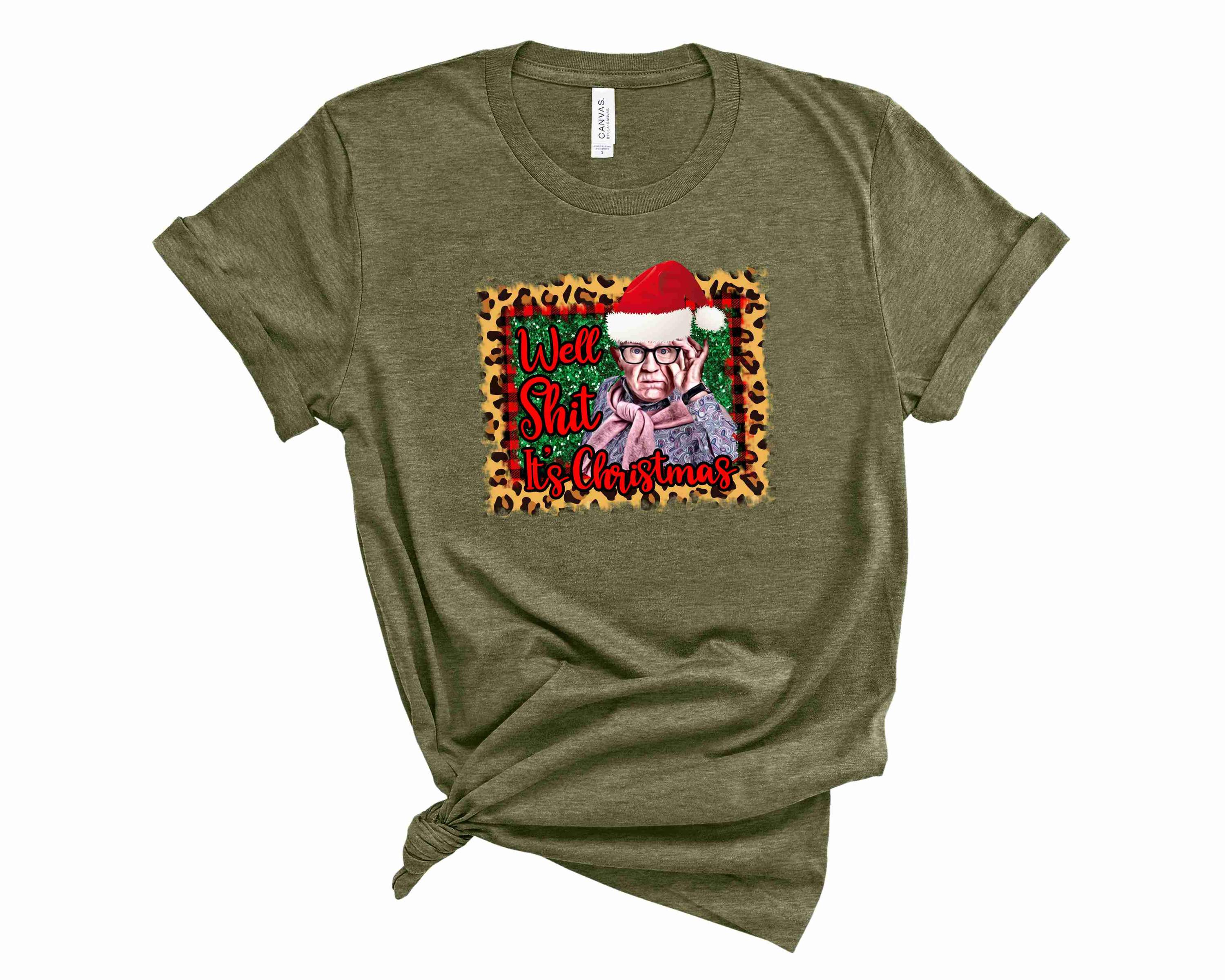 A festive unisex graphic tee featuring the text 'Well, It's Christmas' in vibrant colors, perfect for holiday celebrations.