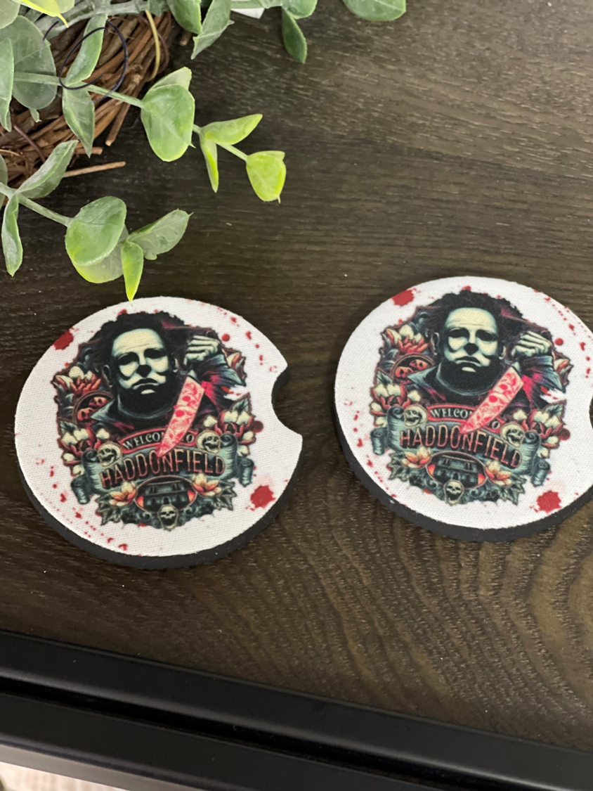 Welcome To Haddonfield Neoprene Car Coaster Set featuring a horror-themed design, perfect for car cup holders.