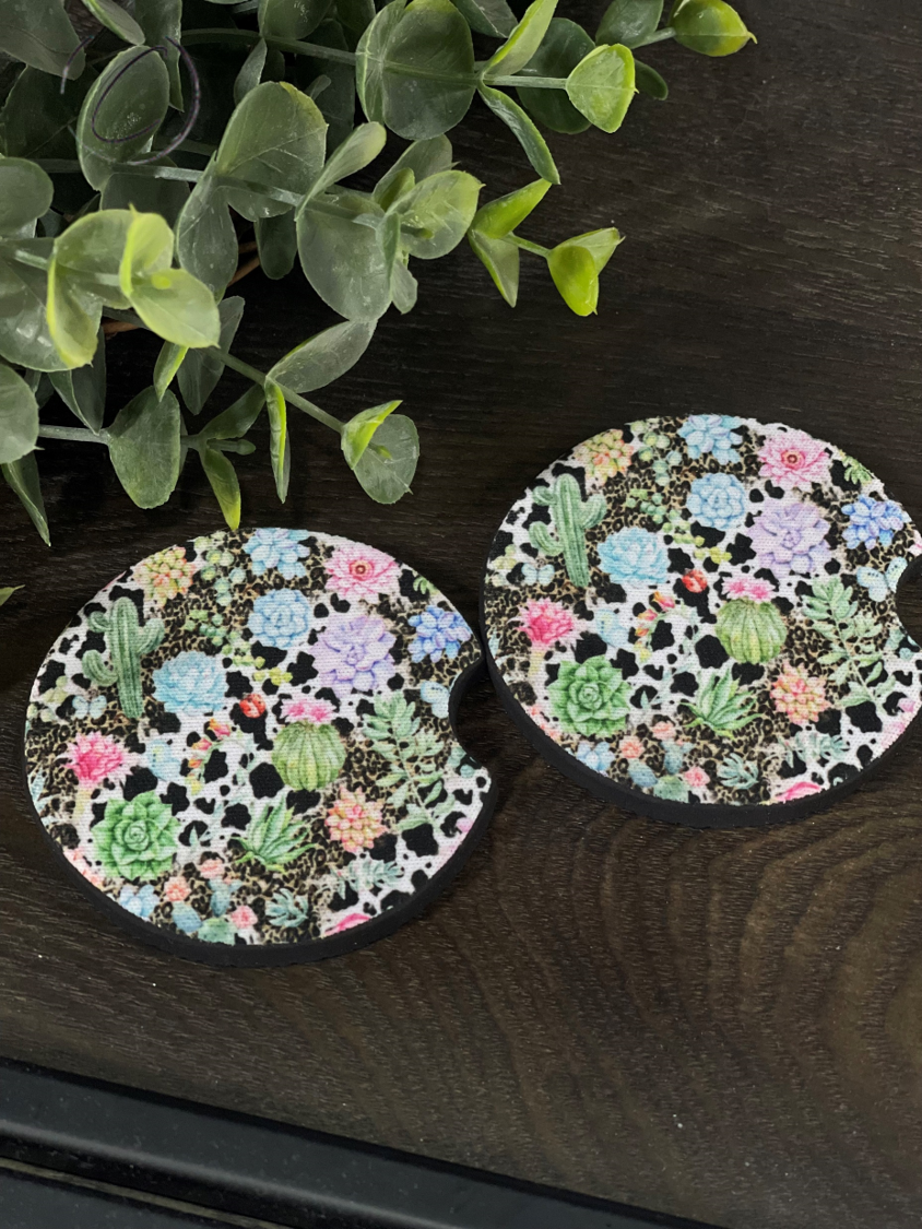 Western Succulent Car Coaster Set featuring vibrant succulent designs on durable neoprene material, perfect for car cup holders.