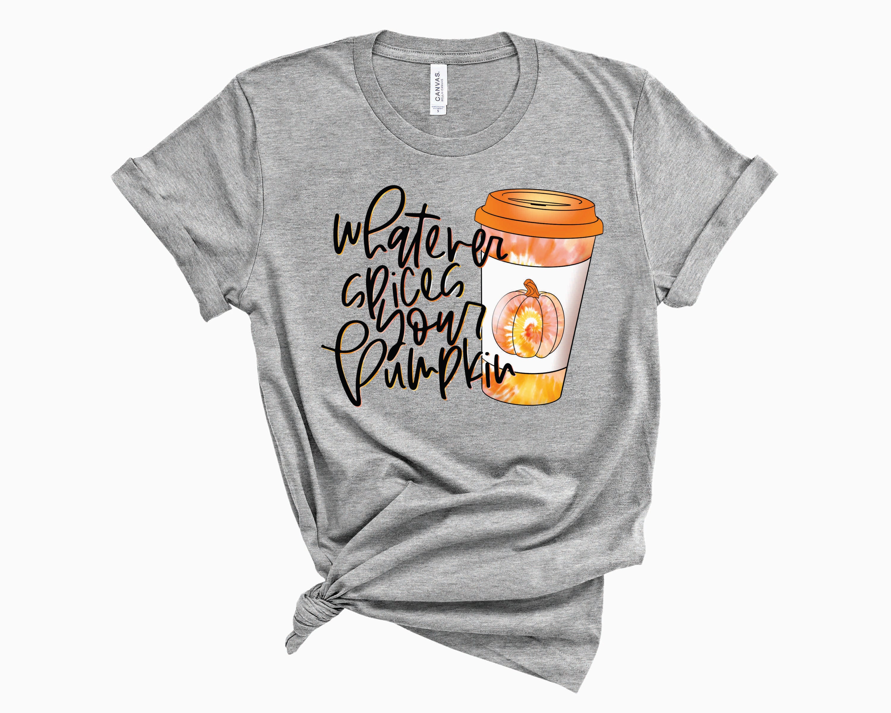 A vibrant tiedye graphic tee featuring the phrase 'Whatever Spices Your Pumpkin' in a playful font, perfect for fall fashion.