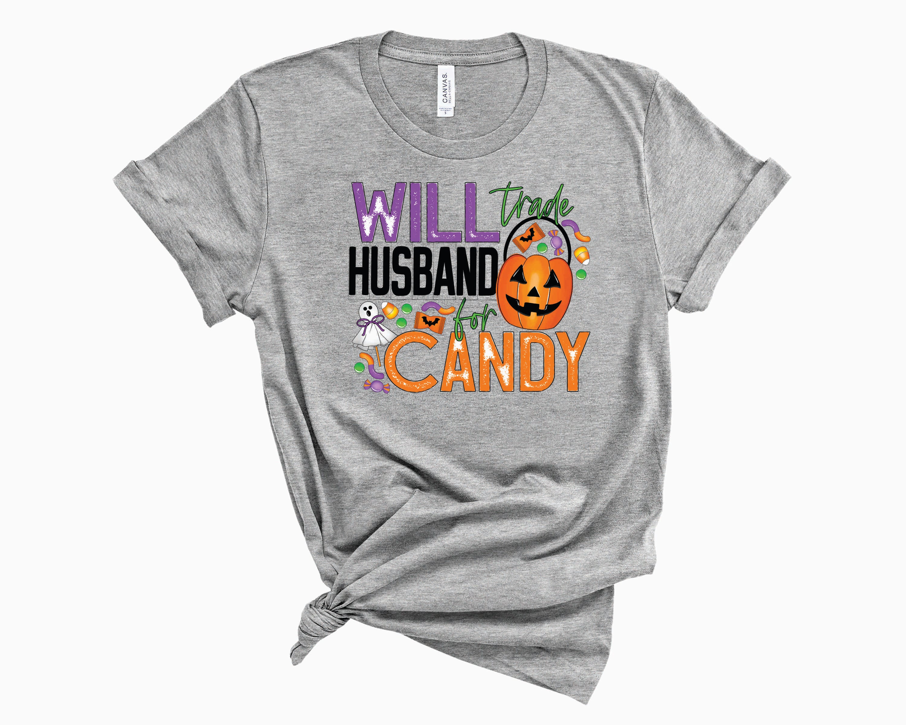 A humorous graphic tee featuring the text 'Will Trade Husband For Candy' in bold letters, showcasing a playful design suitable for candy lovers.