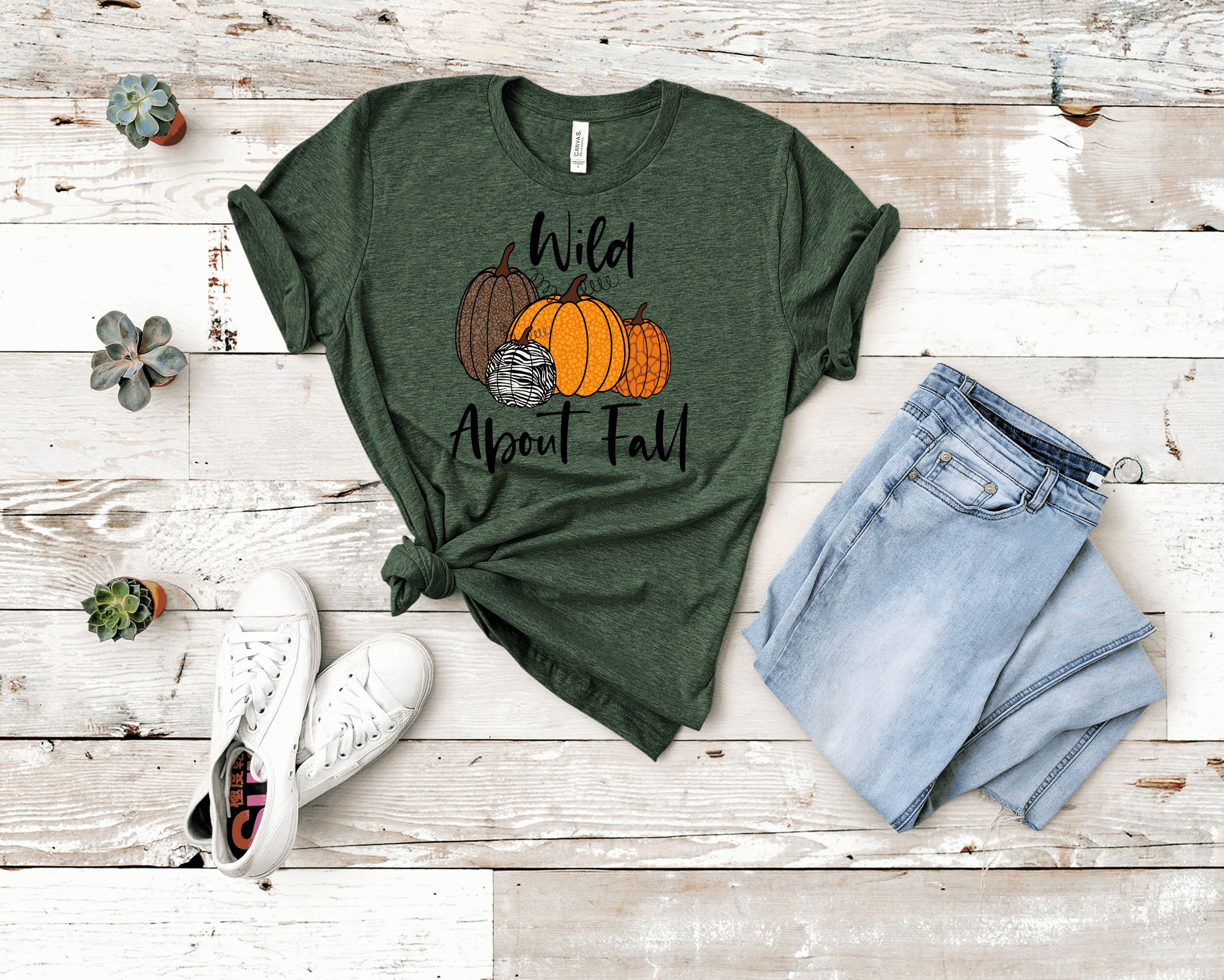 Wild About Fall graphic tee featuring autumn-themed design on a soft Bella Canvas unisex t-shirt.