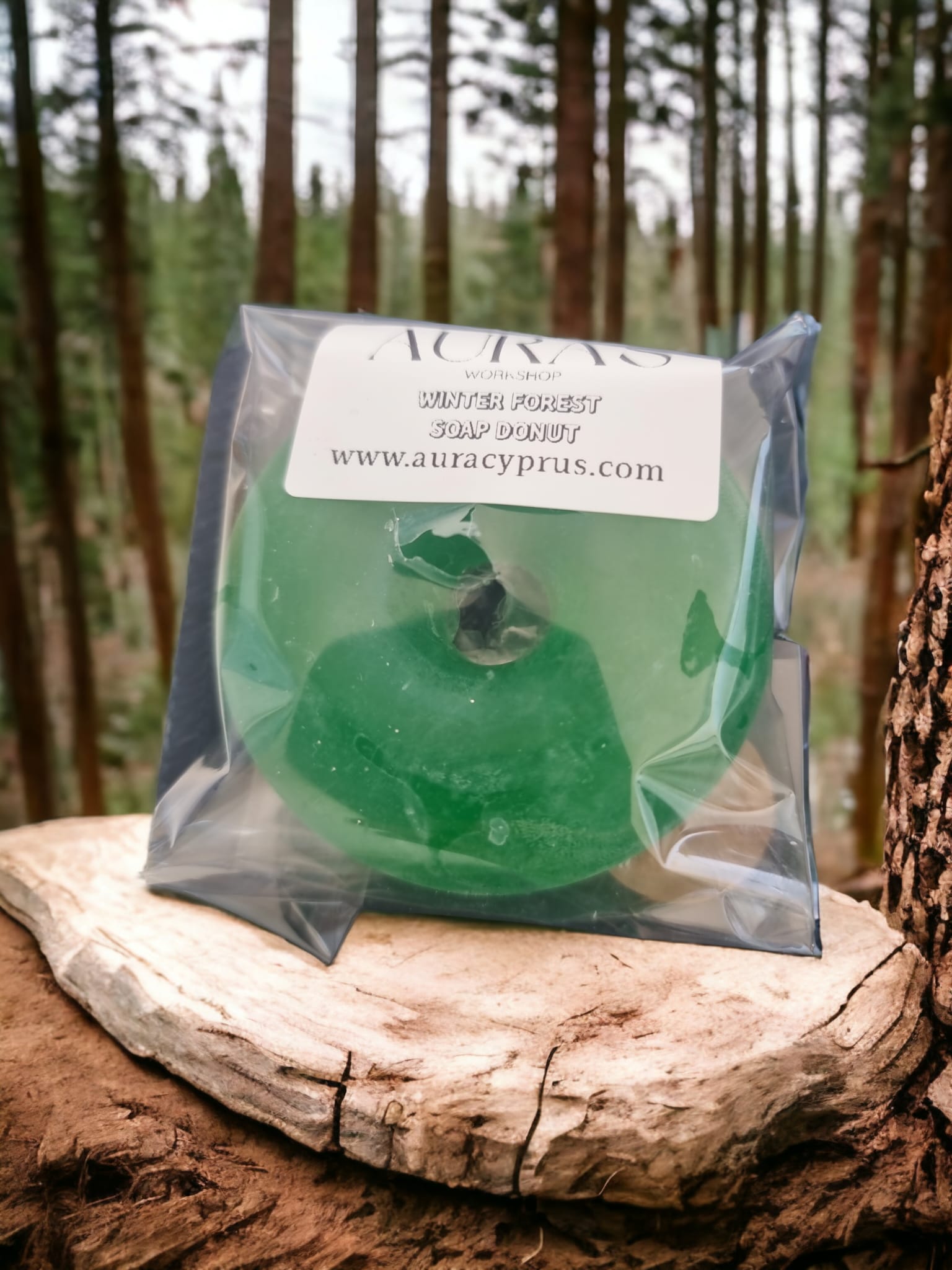 A beautifully crafted Winter Forest Soap Donut, shaped like a donut with intricate designs, showcasing its winter forest scent and colors.