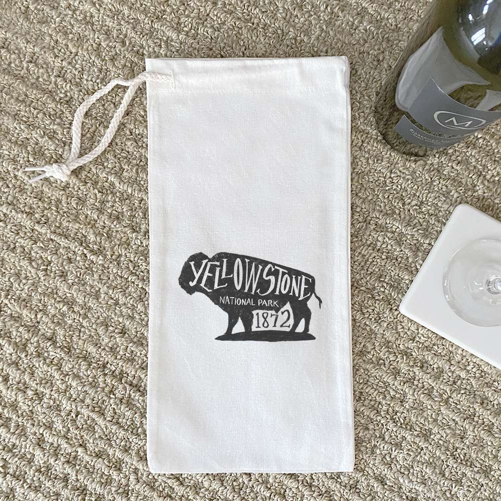 Yellowstone National Park Buffalo canvas wine bag with drawstring closure, designed to hold a standard 750mL wine bottle.