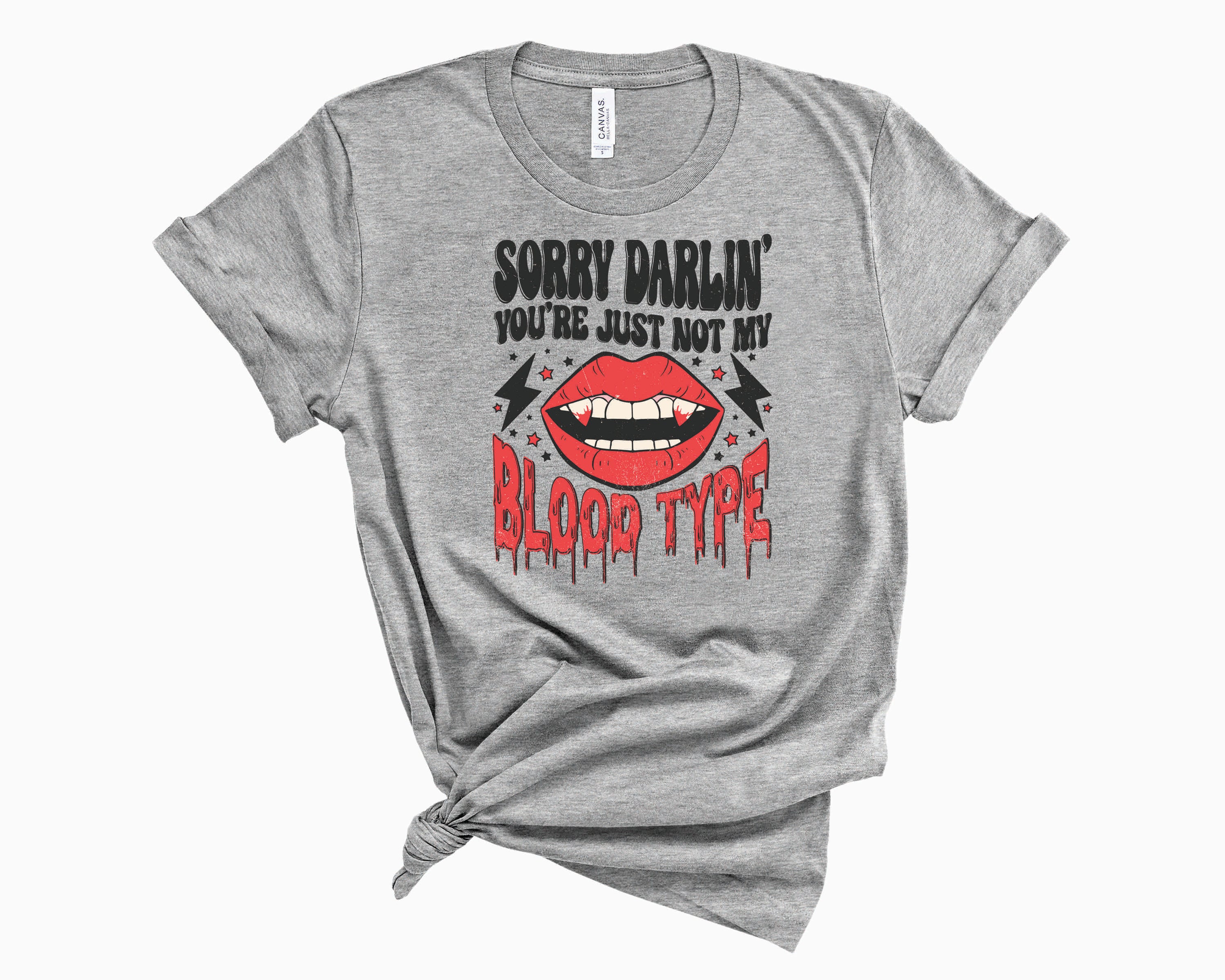 You're Not My Blood Type graphic tee featuring a bold statement design on a unisex t-shirt.