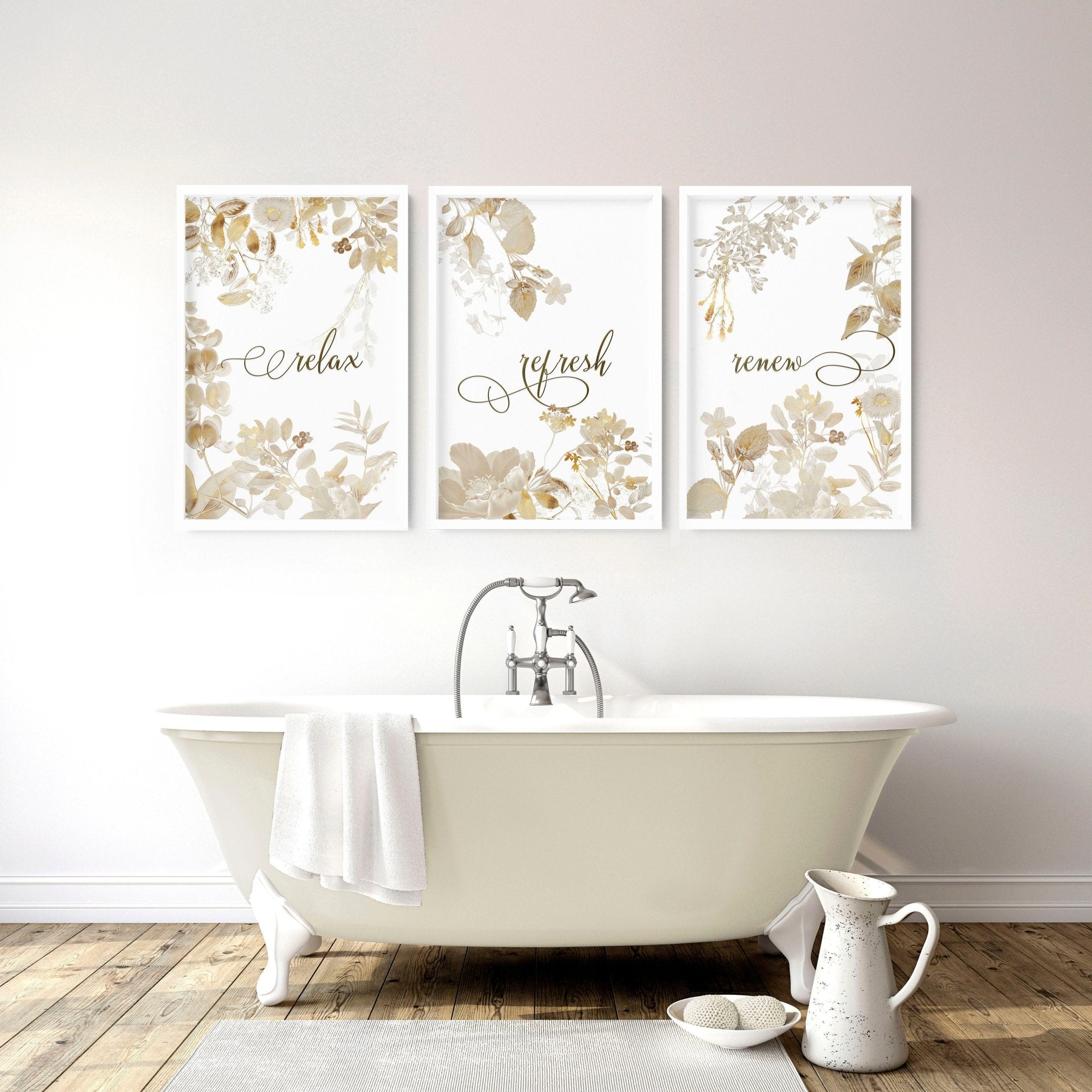 Set of 3 framed botanical wall art prints in gold, perfect for bathroom decor, showcasing elegant floral designs.