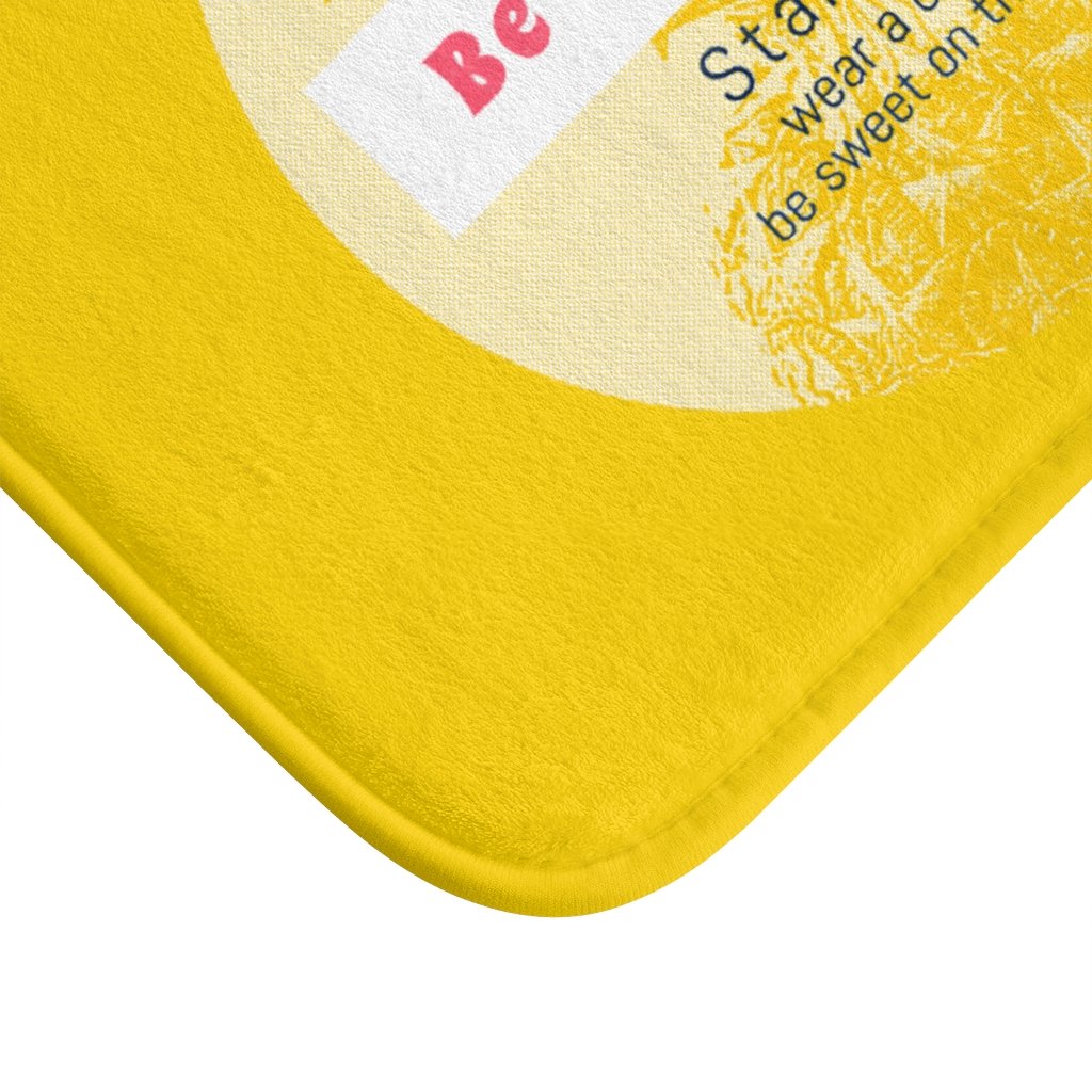 Be a Pineapple Positive Message Bath Mat with anti-slip backing, featuring a cheerful pineapple design in a soft microfiber material.