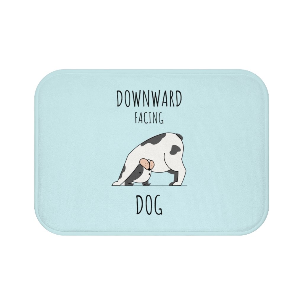 Downward Facing Dog Yoga Bath Mat in a stylish bathroom setting, showcasing its anti-slip backing and soft microfiber texture.
