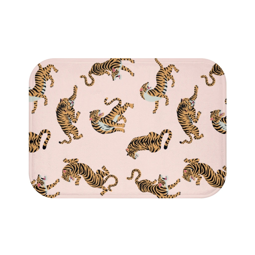 Leopard print bath mat with anti-slip backing, showcasing a stylish design for home accents.