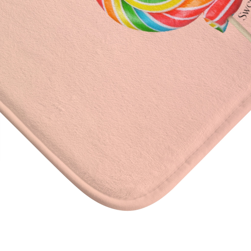 Lollipop Sweetness of Life Message Bath Mat with vibrant colors and playful design, featuring anti-slip backing and soft microfiber material.