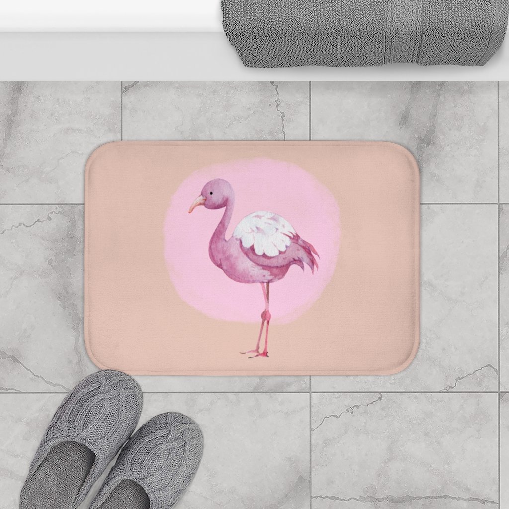 A vibrant Pink Flamingo Bath Mat featuring a playful flamingo design, made from soft microfiber with anti-slip backing for safety.