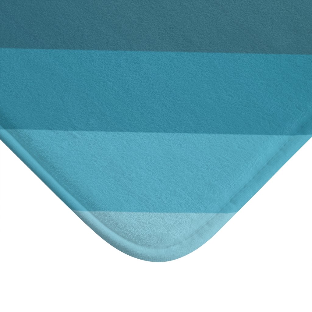 Striped bath mat with anti-slip backing, showcasing a stylish design and plush microfiber texture, perfect for bathroom decor.