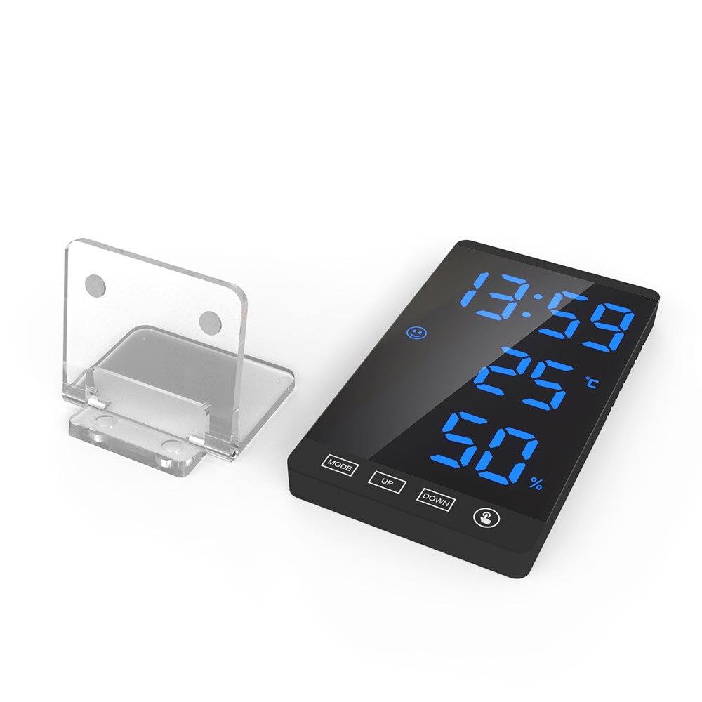 Digital Alarm Clock with a sleek mirror surface displaying time, temperature, and humidity, ideal for home or office use.