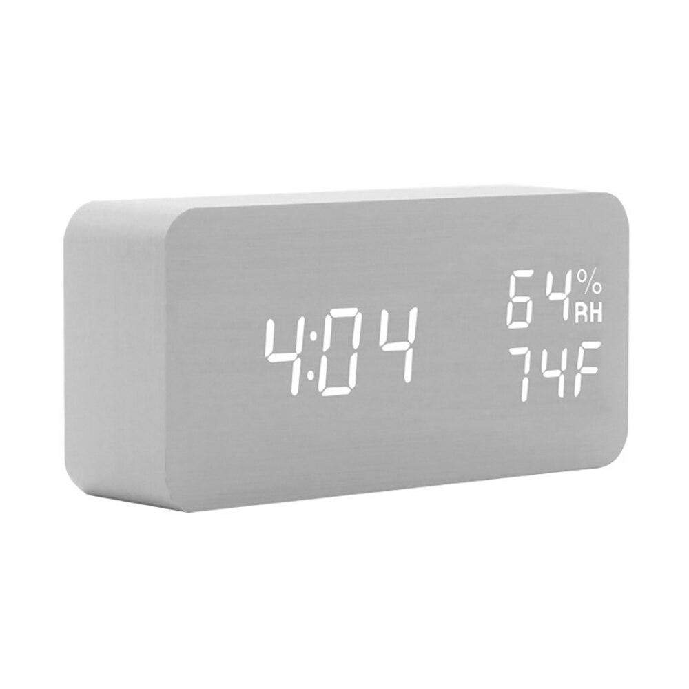 Wooden LED Digital Alarm Clock displaying time, temperature, and humidity with a sleek design, perfect for home decoration.