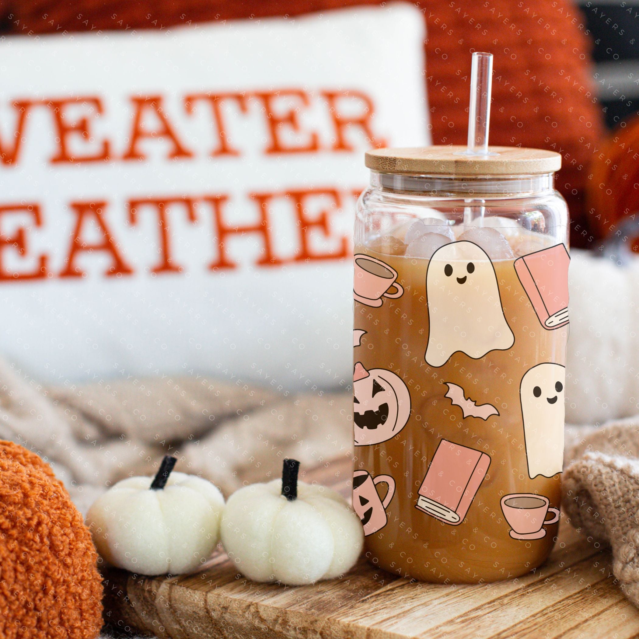 16oz Book Ghosts Glass Cup with Bamboo Lid and Straw, featuring a whimsical ghost design perfect for Halloween and book lovers.