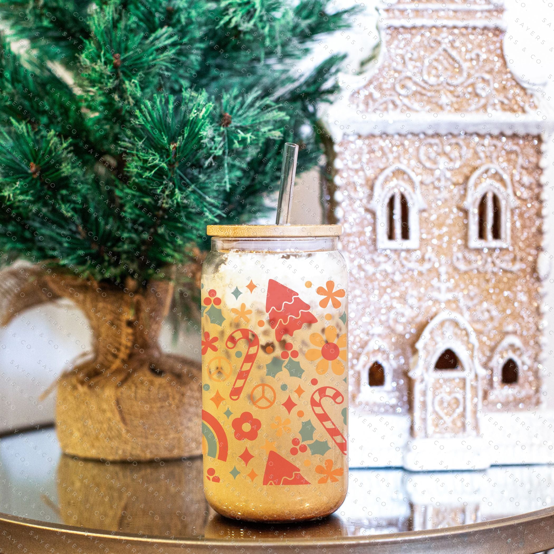 16oz Christmas Groove Glass Cup with Bamboo Lid and Straw, featuring a festive design perfect for holiday drinks.