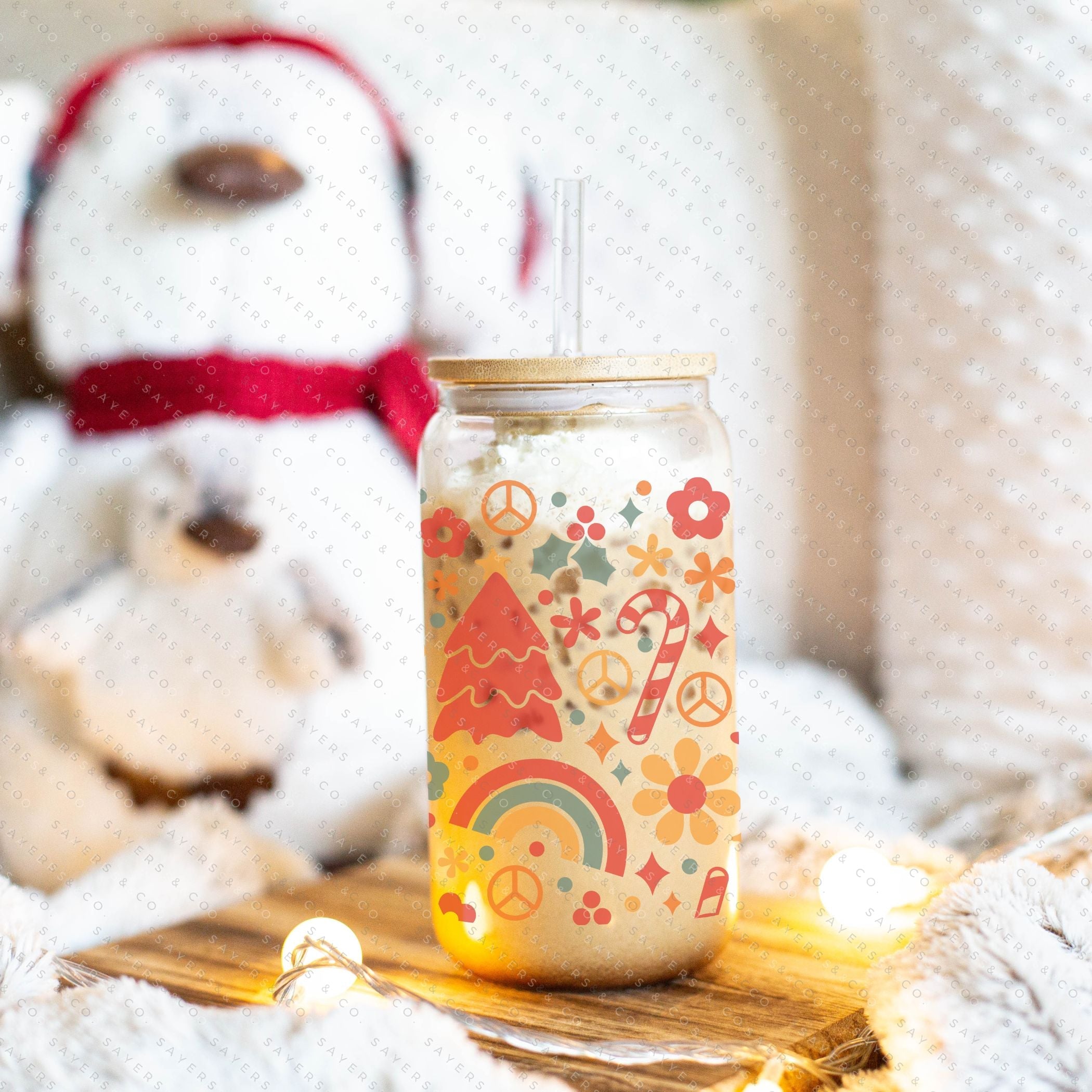 16oz Christmas Groove Glass Cup with Bamboo Lid and Straw, featuring a festive design perfect for holiday drinks.