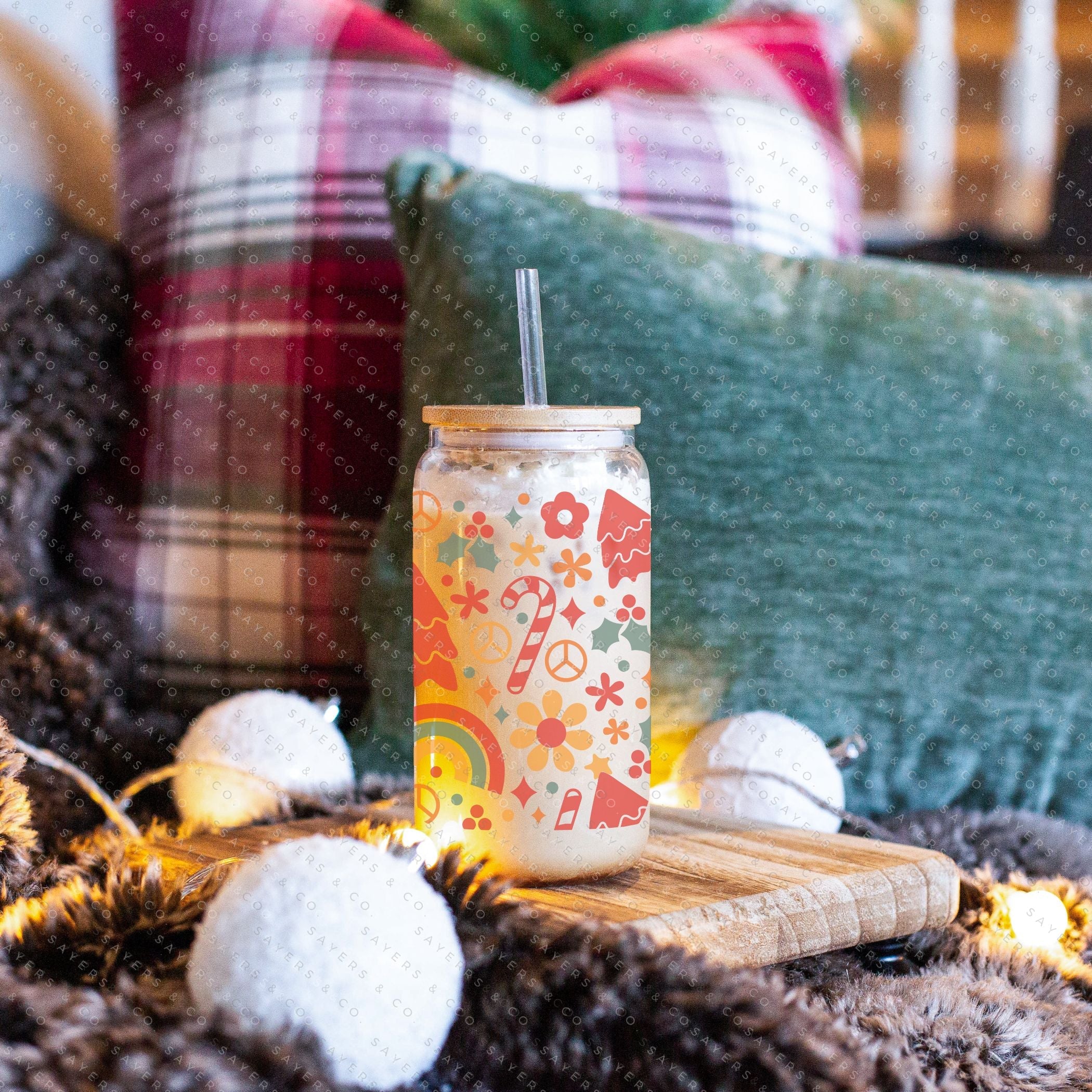 16oz Christmas Groove Glass Cup with Bamboo Lid and Straw, featuring a festive design perfect for holiday drinks.
