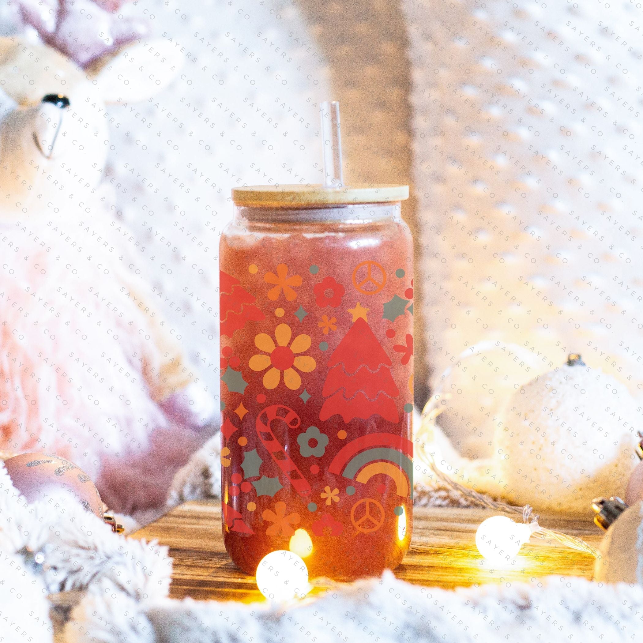 16oz Christmas Groove Glass Cup with Bamboo Lid and Straw, featuring a festive design perfect for holiday drinks.