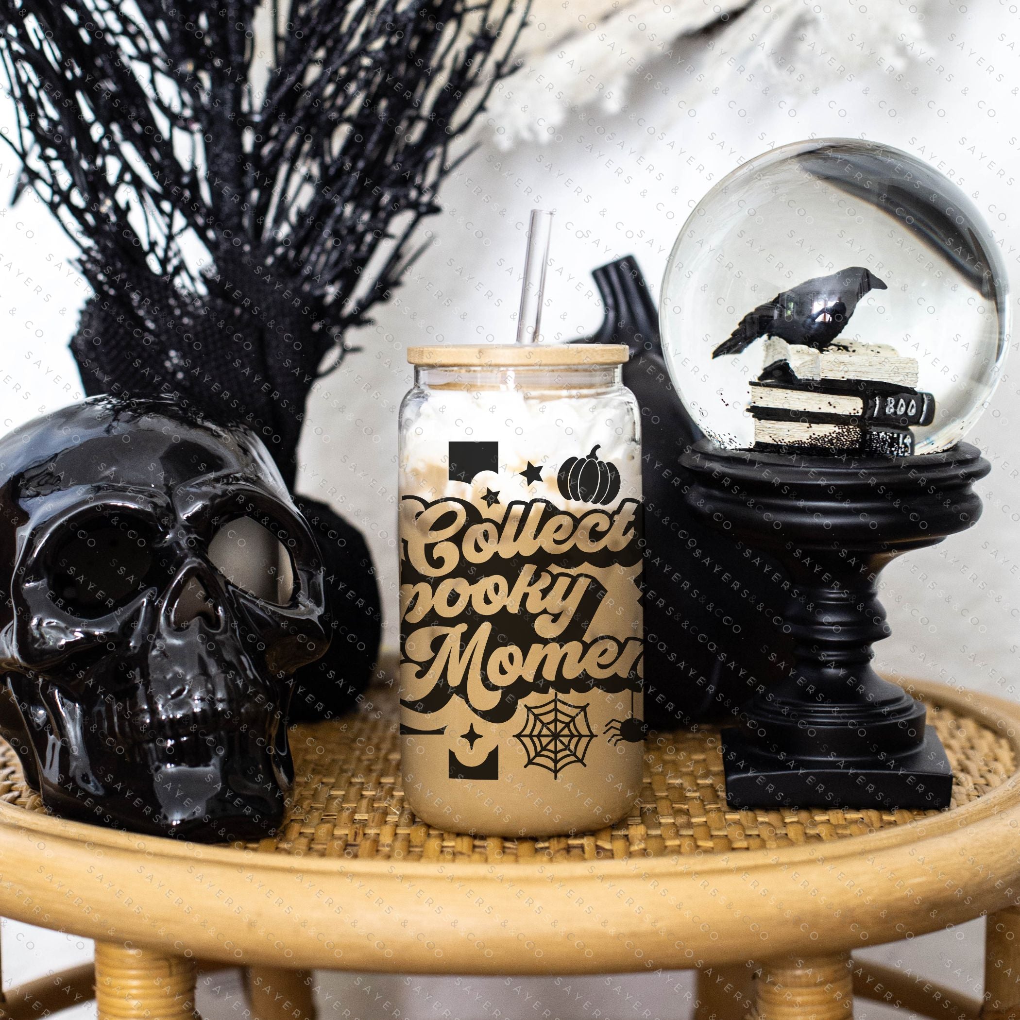 16oz Collect Spooky Moments Glass Cup with bamboo lid and straw, featuring a fun Halloween design perfect for seasonal beverages.
