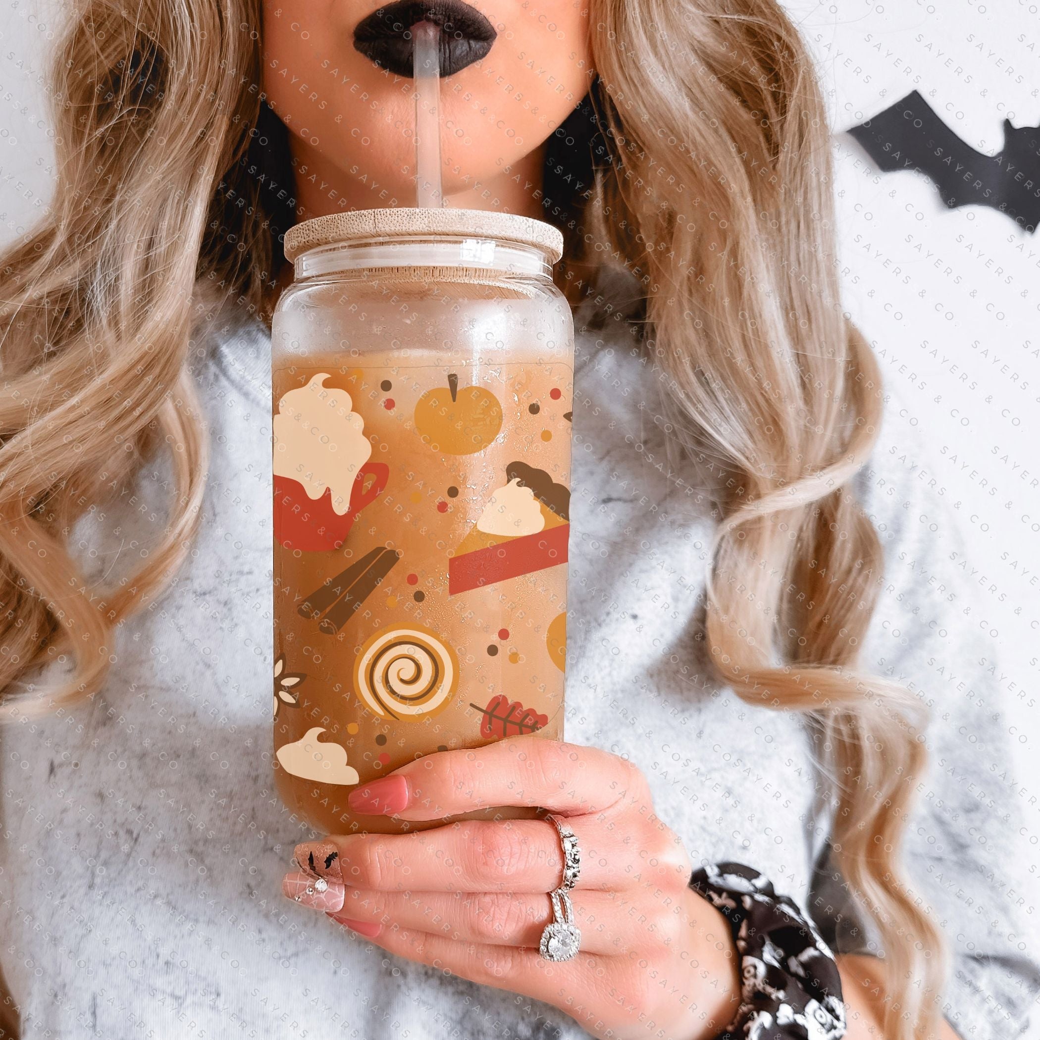 16oz Hello Fall Glass Cup with Bamboo Lid and Straw, featuring a fall-themed design, perfect for seasonal beverages.