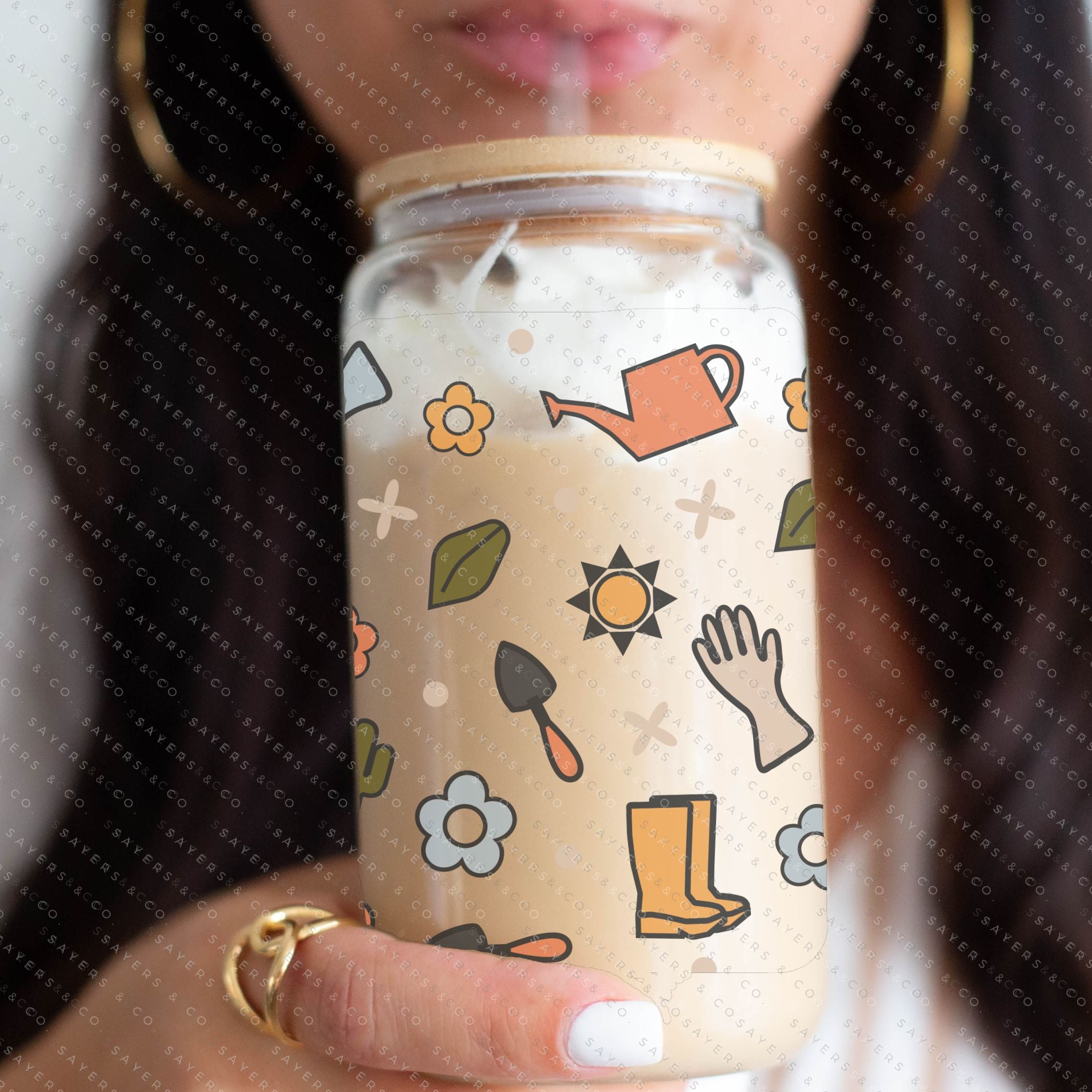 16oz Hoeing Aint Easy Glass Cup with bamboo lid and straw, showcasing a fun design perfect for summer drinks.