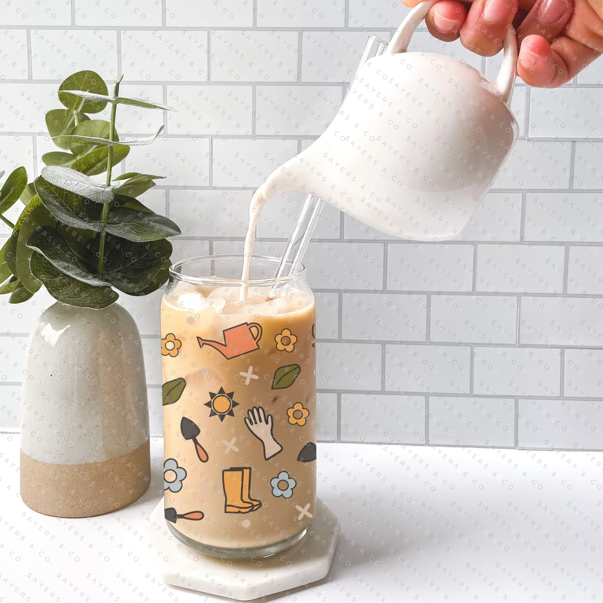 16oz Hoeing Aint Easy Glass Cup with bamboo lid and straw, showcasing a fun design perfect for summer drinks.