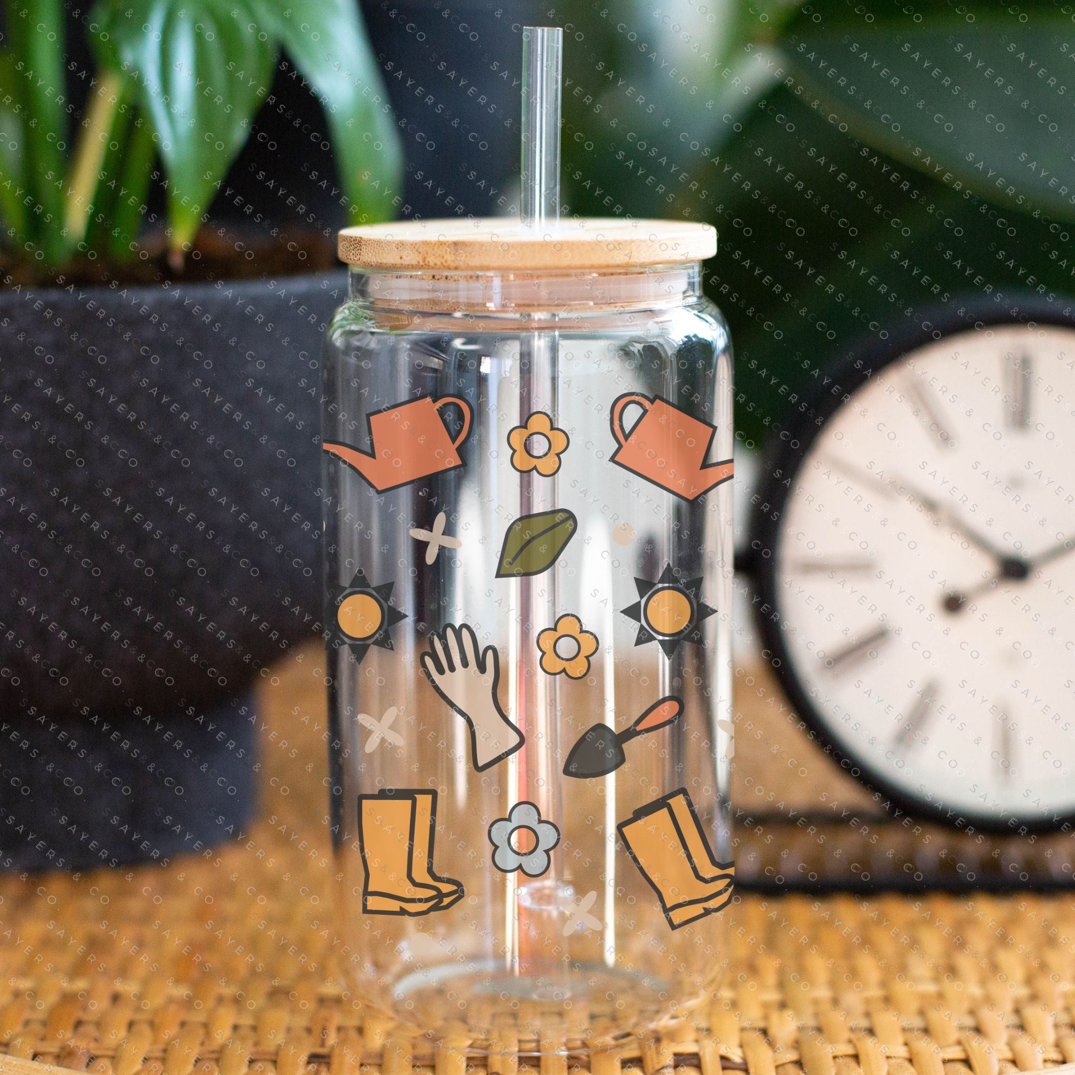 16oz Hoeing Aint Easy Glass Cup with bamboo lid and straw, showcasing a fun design perfect for summer drinks.