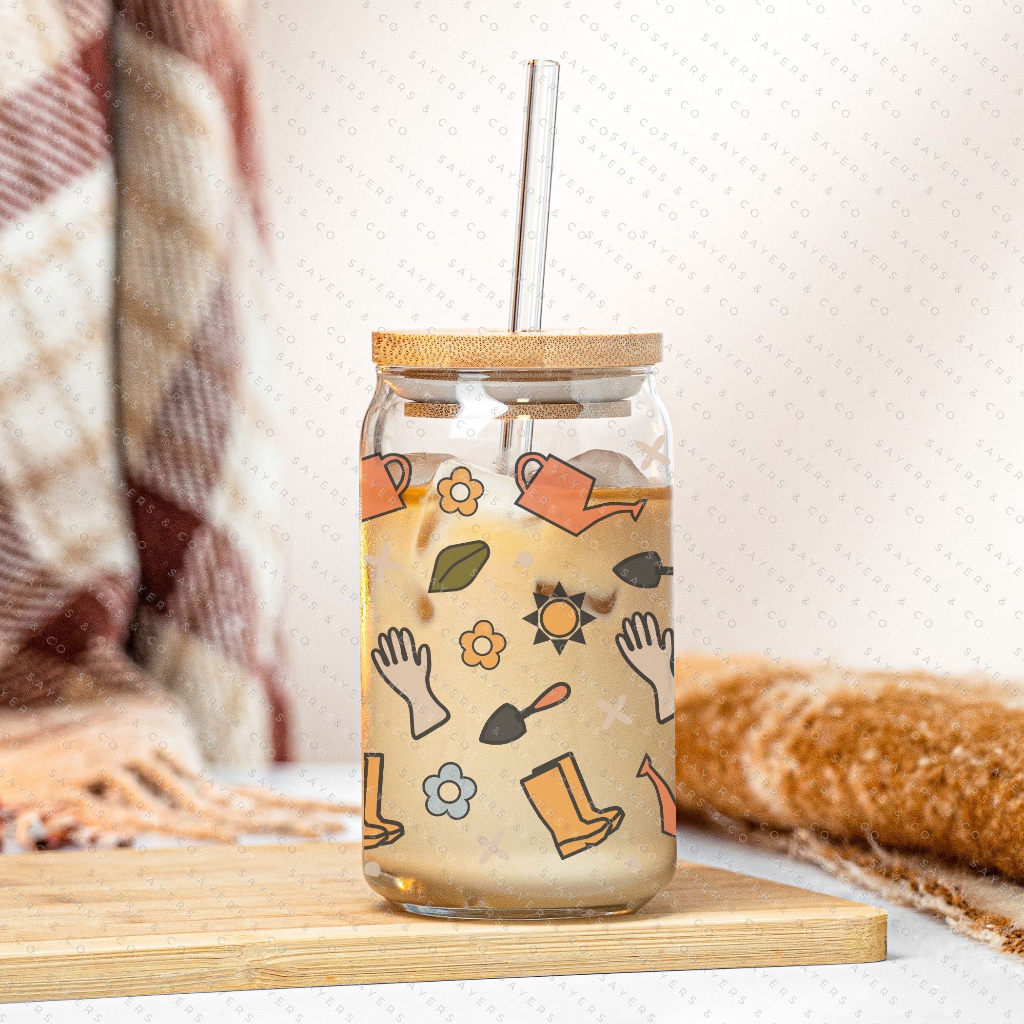 16oz Hoeing Aint Easy Glass Cup with bamboo lid and straw, showcasing a fun design perfect for summer drinks.