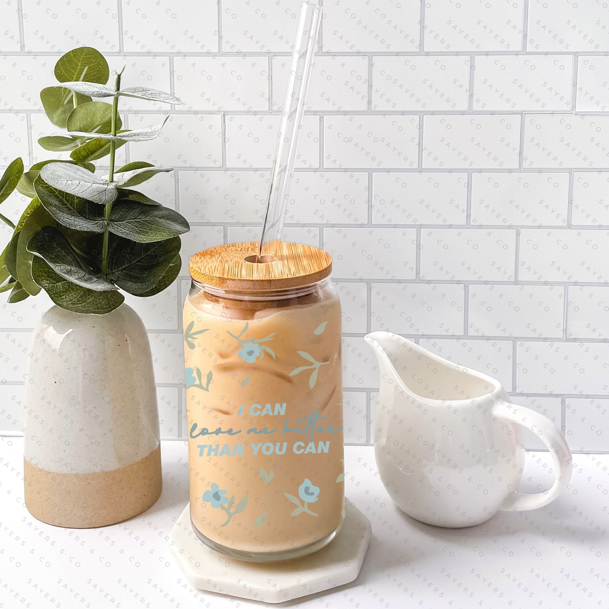 16oz I Can Love Me Better Glass Cup with bamboo lid and straw, showcasing a stylish design perfect for various beverages.