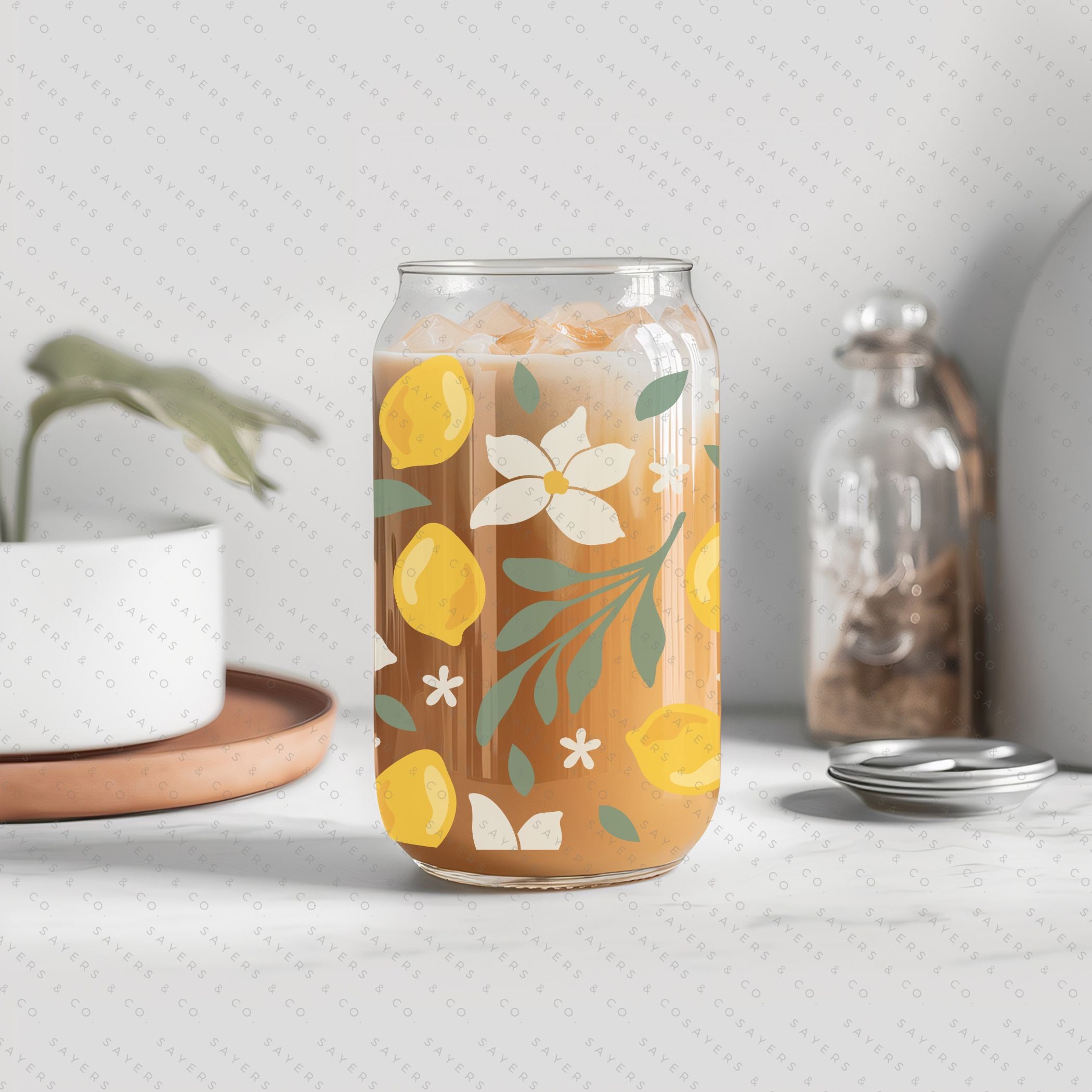 16oz Lemon Bloom Glass Cup featuring a bamboo lid and straw, designed for stylish beverage enjoyment.
