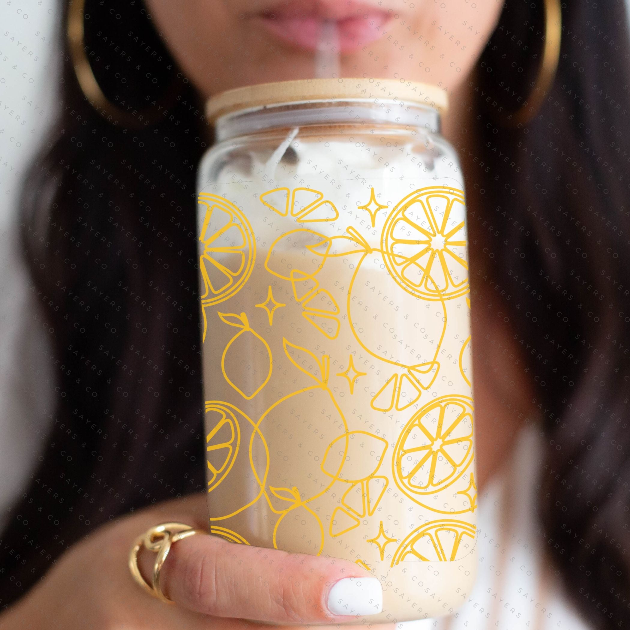 16oz Lemon Lock Glass Cup with Bamboo Lid and Straw, featuring a vibrant lemon design, perfect for beverages.