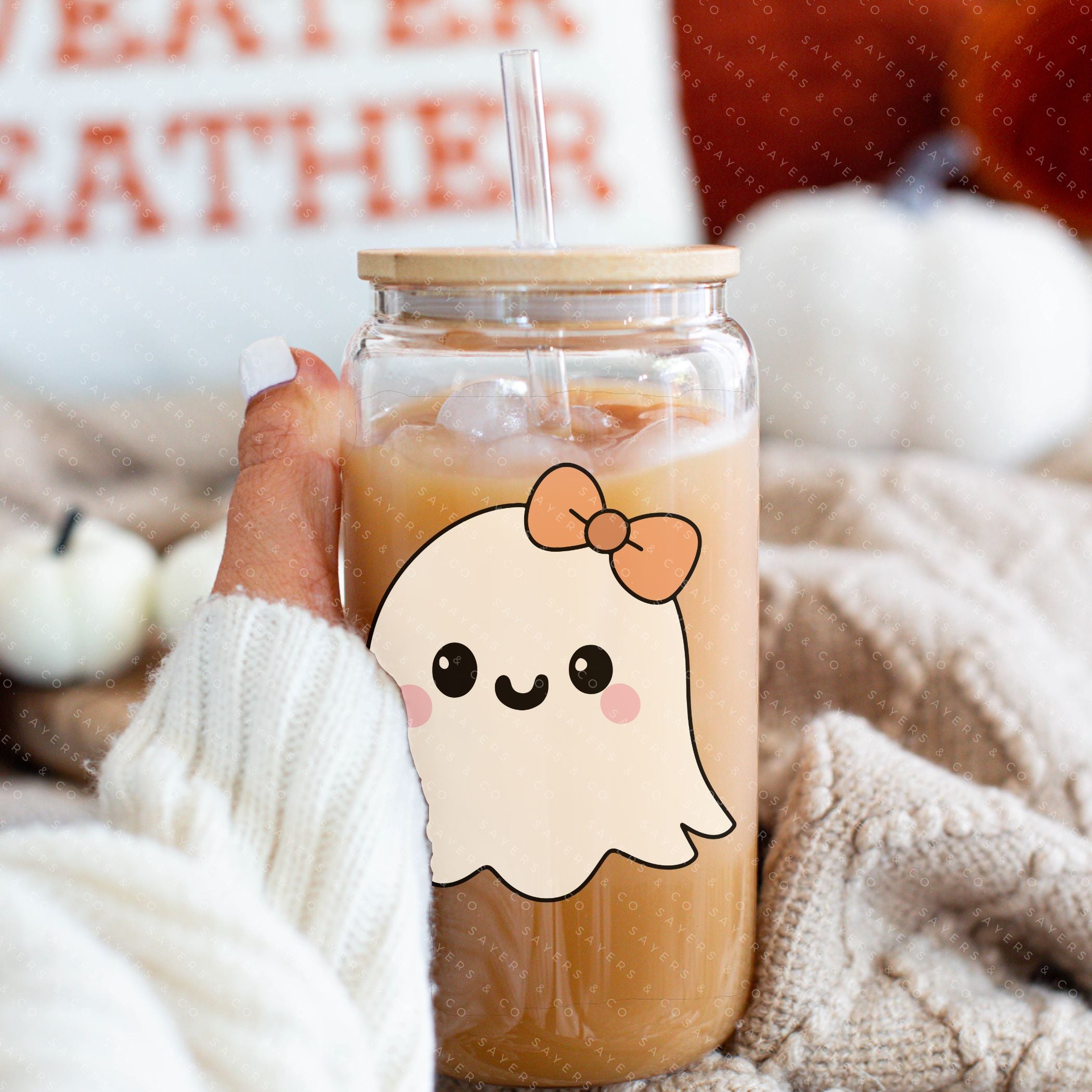 16oz Lil Boo Thang Glass Cup with bamboo lid and straw, featuring a spooky design perfect for Halloween.