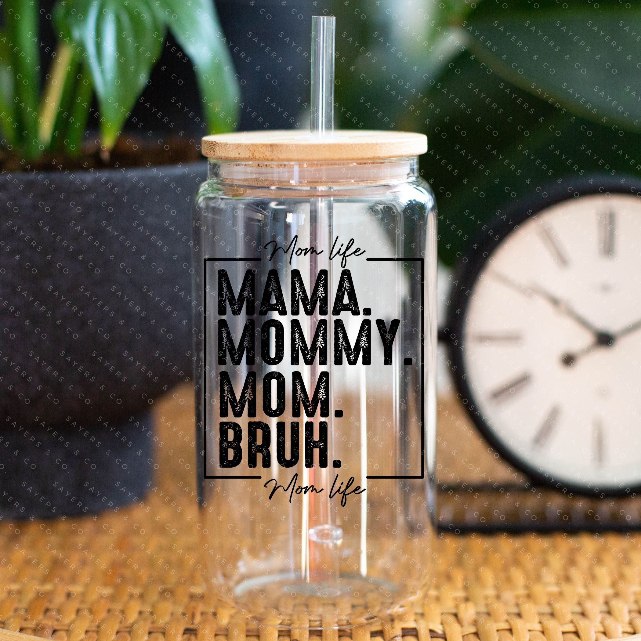 16oz Mama Bruh Glass Cup with bamboo lid and straw, showcasing a humorous design perfect for drinks.
