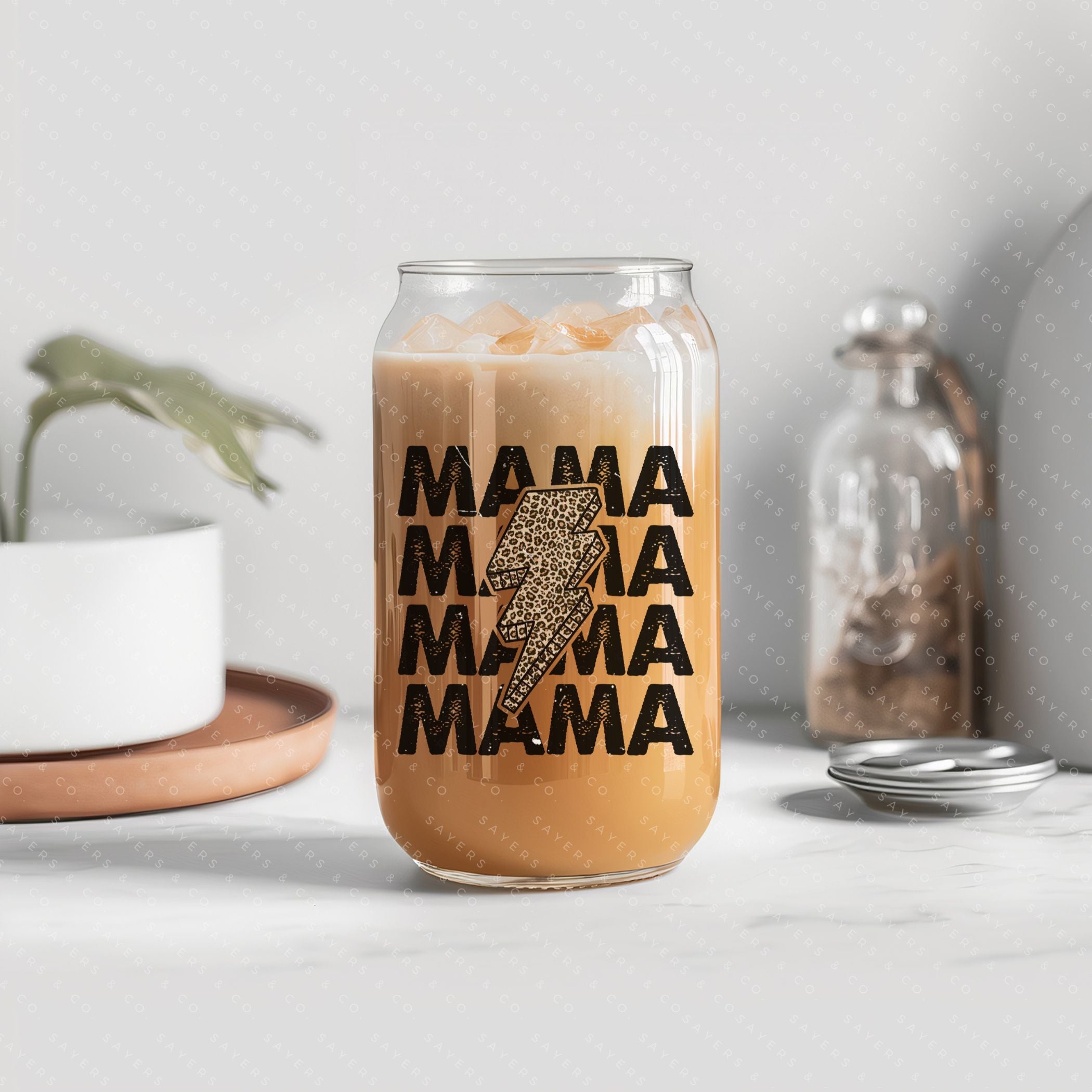 16oz Mama Leopard Bolt Glass Cup with bamboo lid and straw, featuring a stylish leopard design, perfect for drinks.