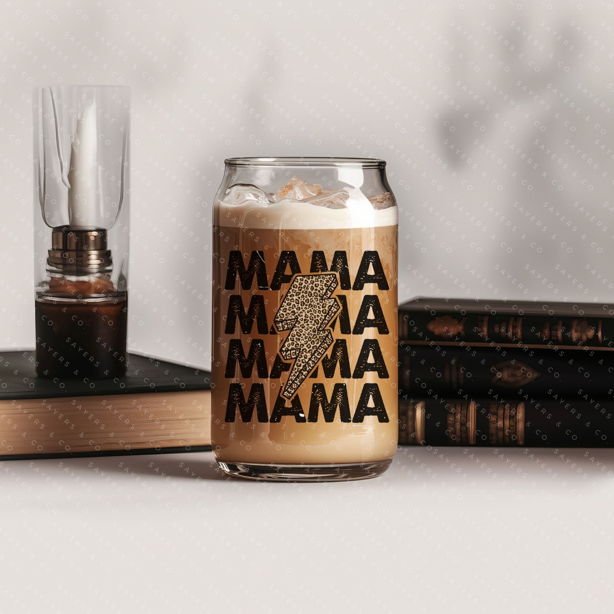 16oz Mama Leopard Bolt Glass Cup with bamboo lid and straw, featuring a stylish leopard design, perfect for drinks.