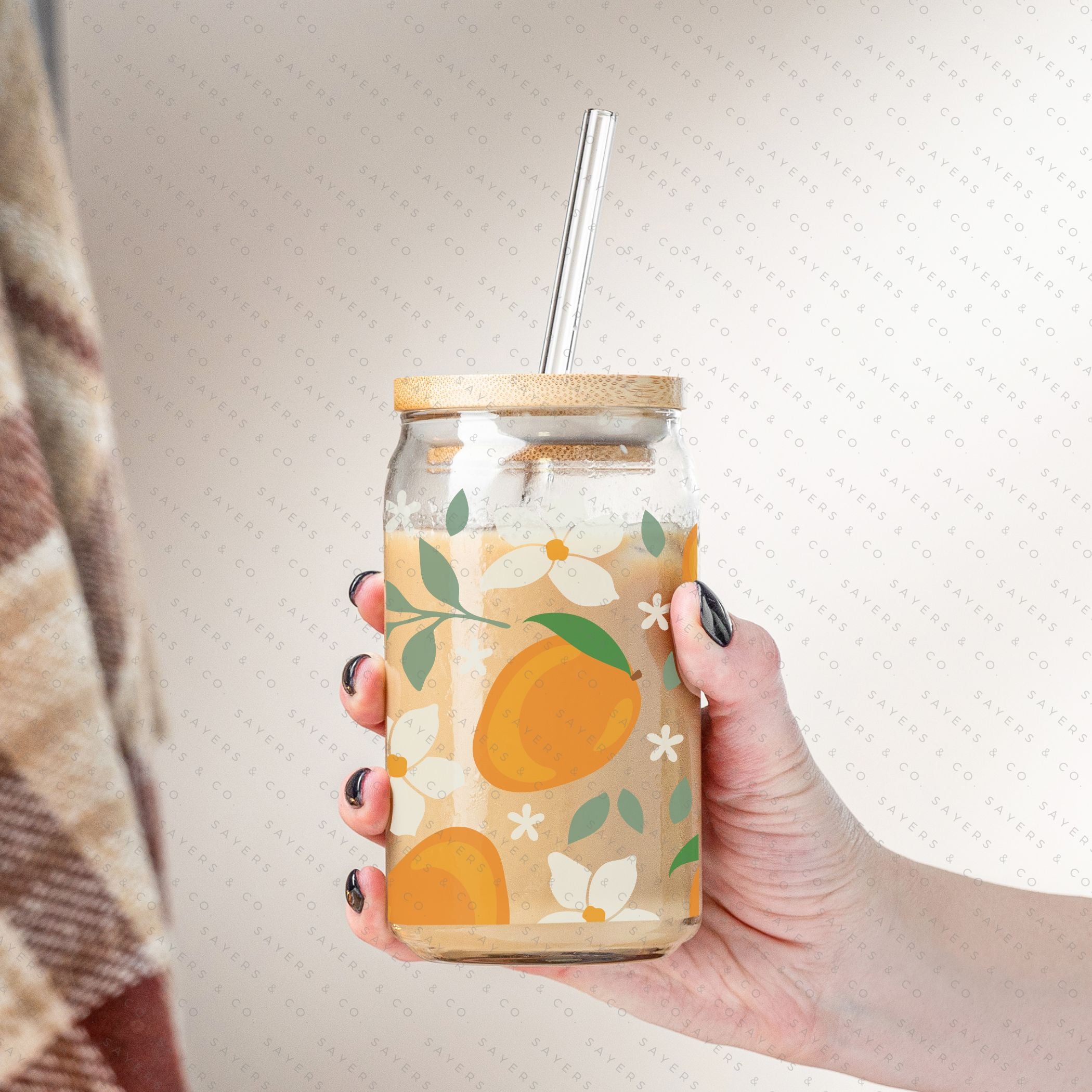 16oz Modern Mangos Glass Cup with bamboo lid and straw, showcasing a vibrant mango design, perfect for various beverages.