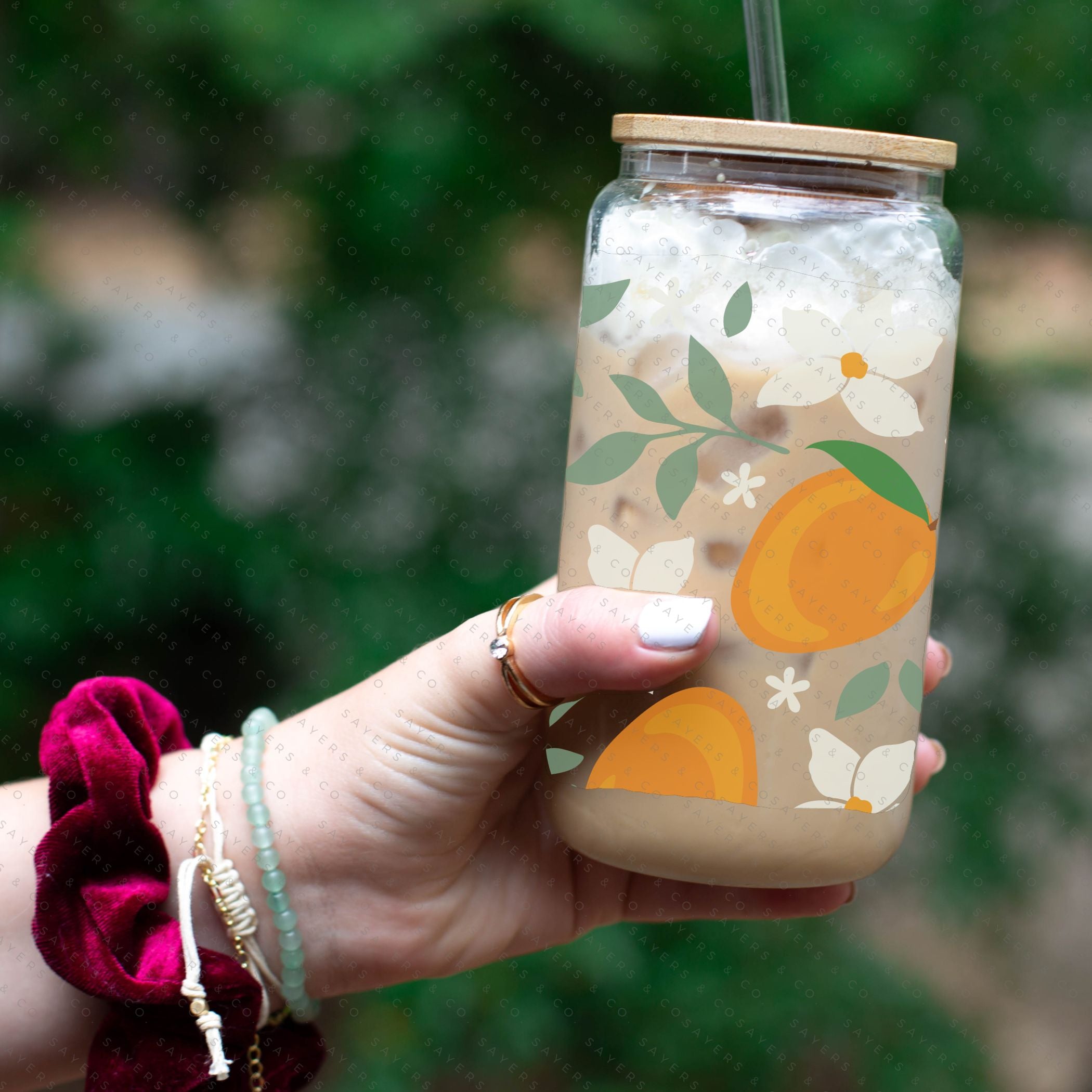 16oz Modern Mangos Glass Cup with bamboo lid and straw, showcasing a vibrant mango design, perfect for various beverages.