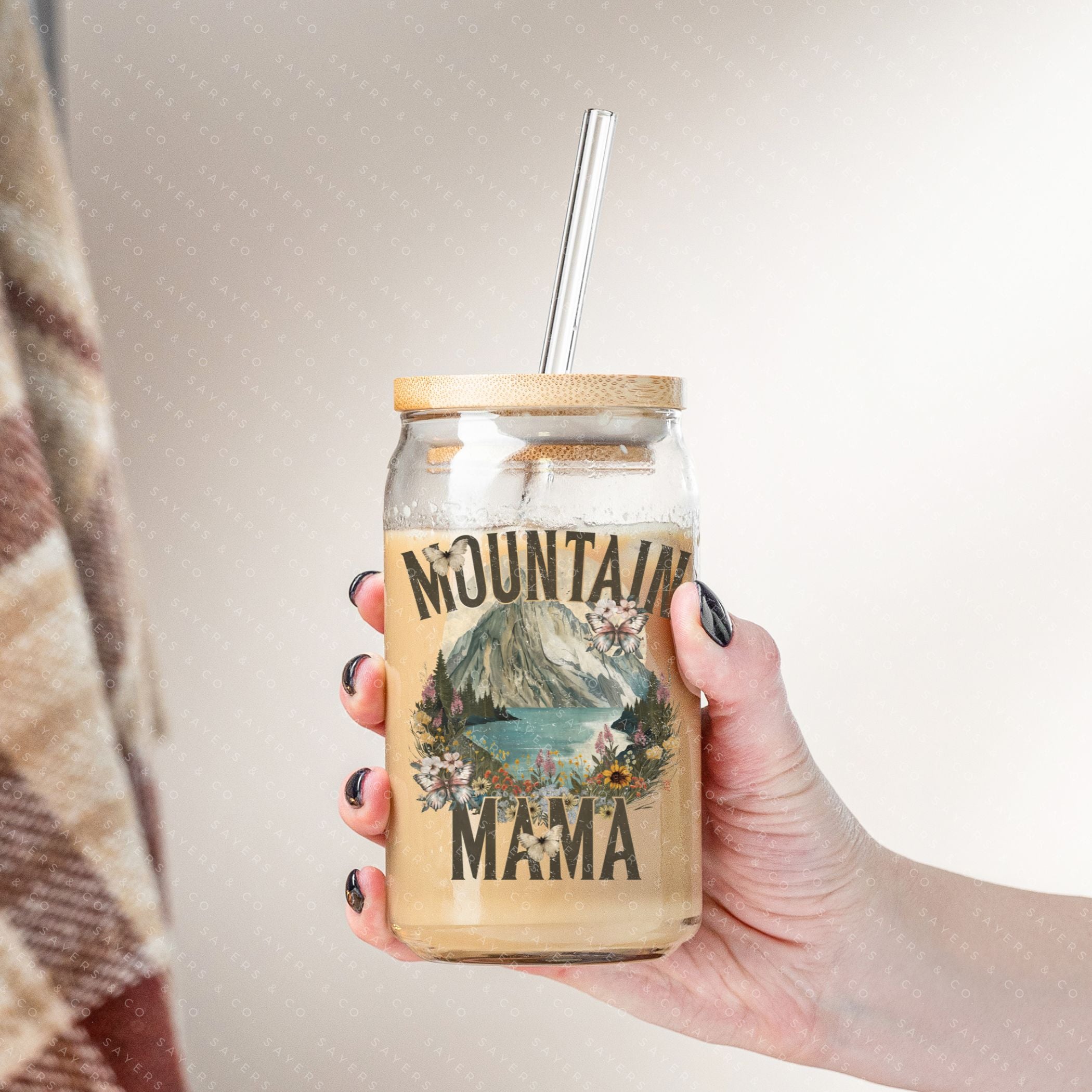 16oz Mountain Mama Glass Cup with Bamboo Lid and Straw, showcasing a clear glass design with a bamboo lid and a clear straw, perfect for beverages.