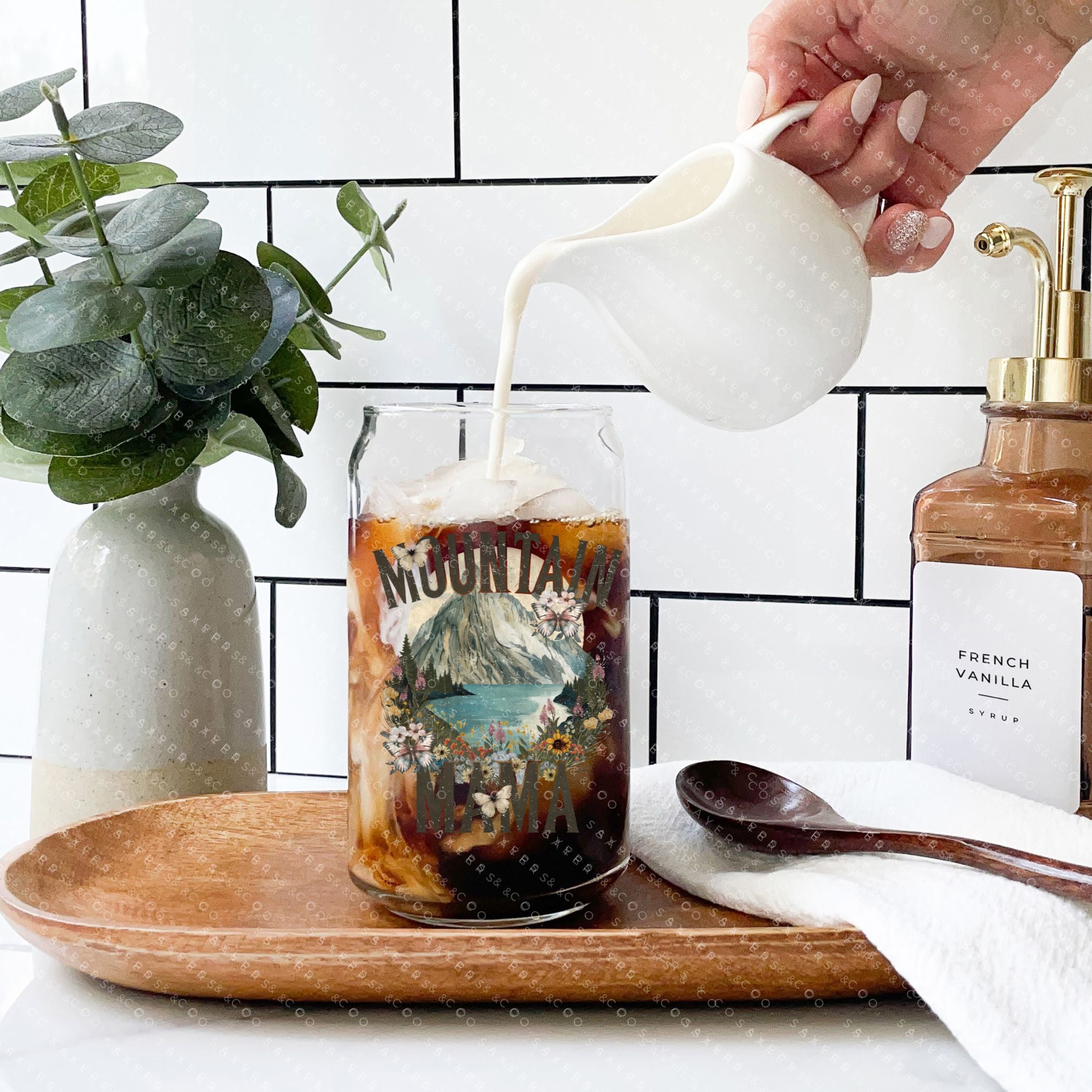 16oz Mountain Mama Glass Cup with Bamboo Lid and Straw, showcasing a clear glass design with a bamboo lid and a clear straw, perfect for beverages.