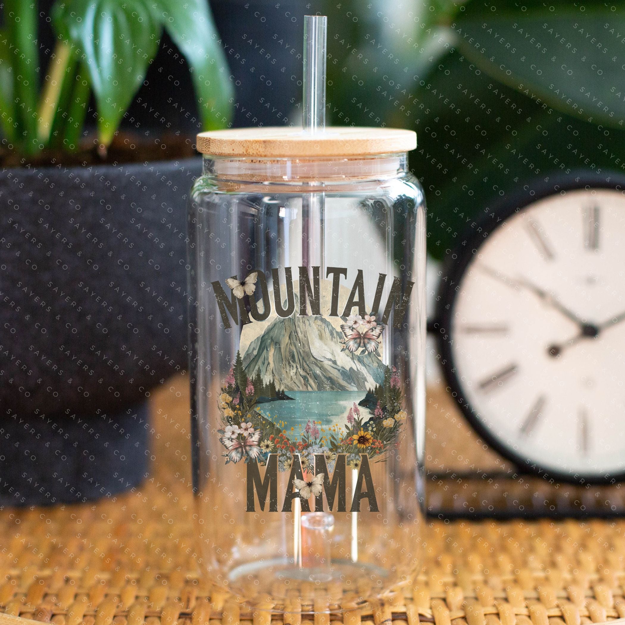 16oz Mountain Mama Glass Cup with Bamboo Lid and Straw, showcasing a clear glass design with a bamboo lid and a clear straw, perfect for beverages.
