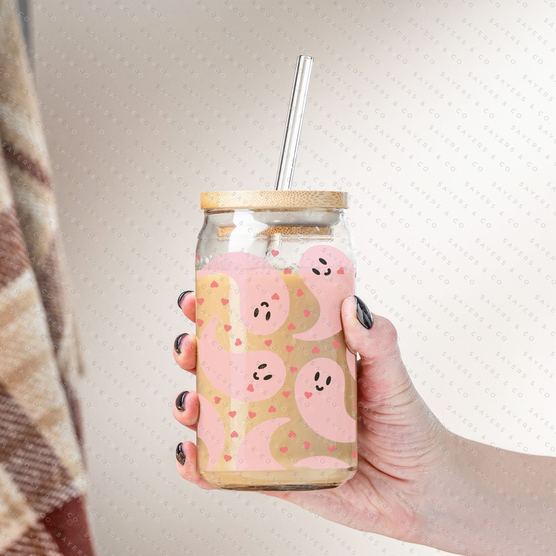 16oz Never Ghost U Glass Cup with bamboo lid and straw, showcasing a unique sublimated design, perfect for various beverages.