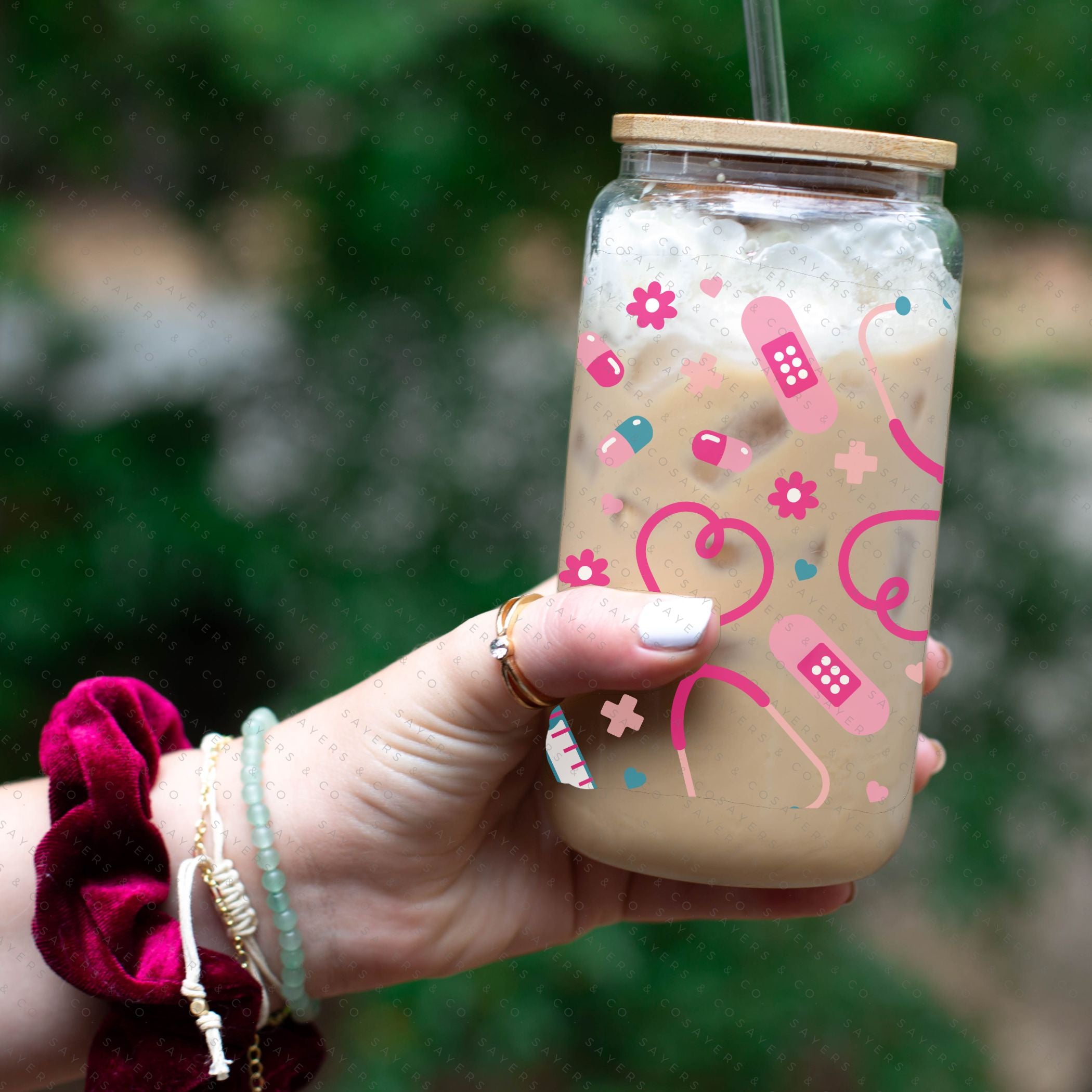 16oz Nifty Nurse Glass Cup with bamboo lid and straw, featuring a fun design perfect for nurses.